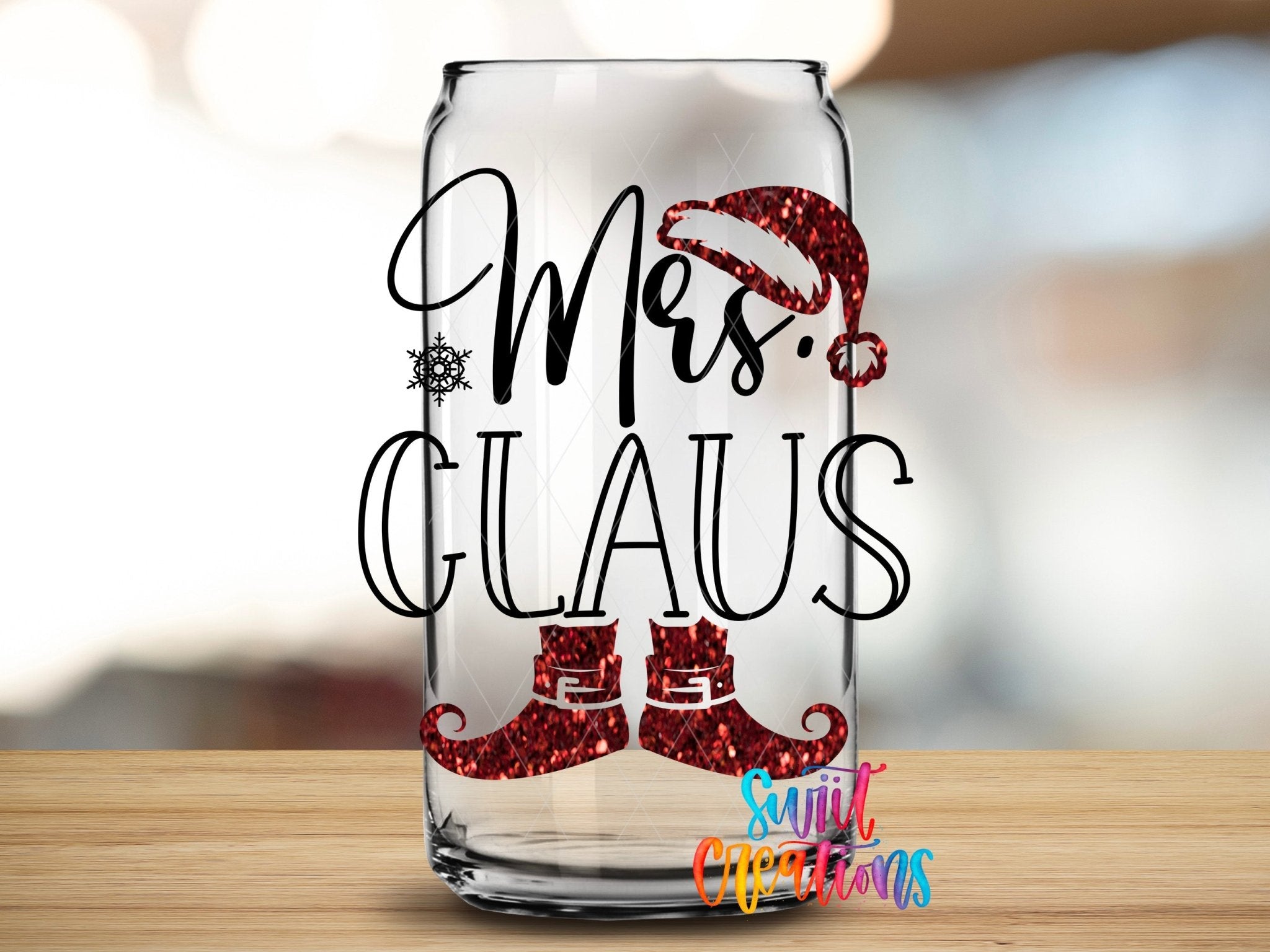 Swiit Creations UV DTF Mrs Claus Christmas transfer applied to a clear glass can