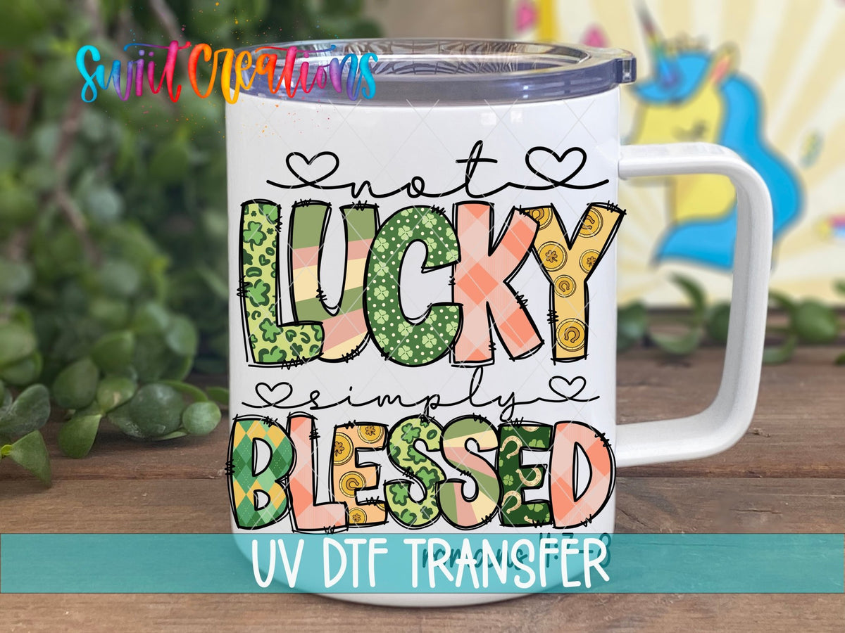 Not Lucky Simply Blessed UV DTF transfer displayed on a white coffee mug from Swiit Creations