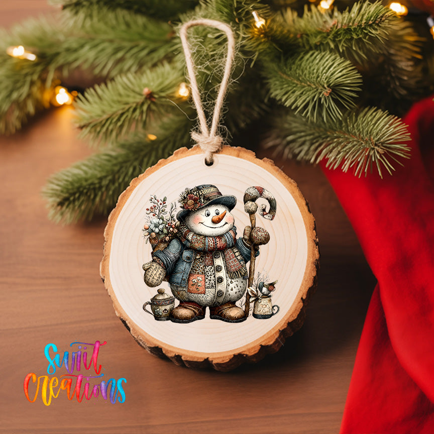 Rustic patchwork snowman ornament UV DTF transfer with floral hat, patterned scarf, and curved winter staff, mockup view 6