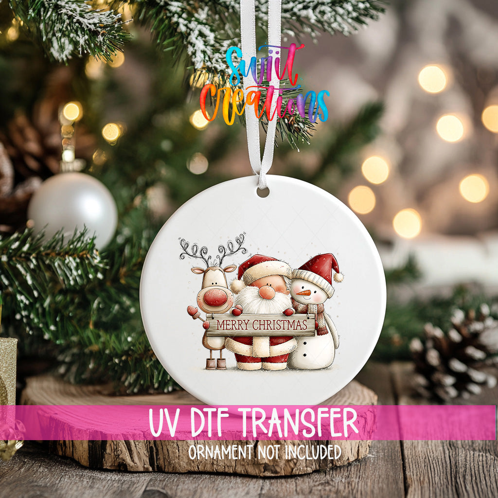 Santa reindeer and snowman ornament UV DTF transfer holding Merry Christmas sign, mockup view 2
