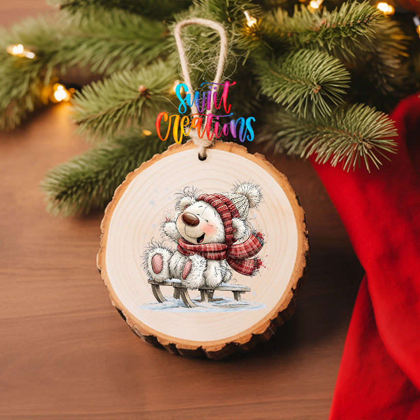 White Christmas bear ornament UV DTF transfer beside decorated tree and wrapped gifts, mockup view 6