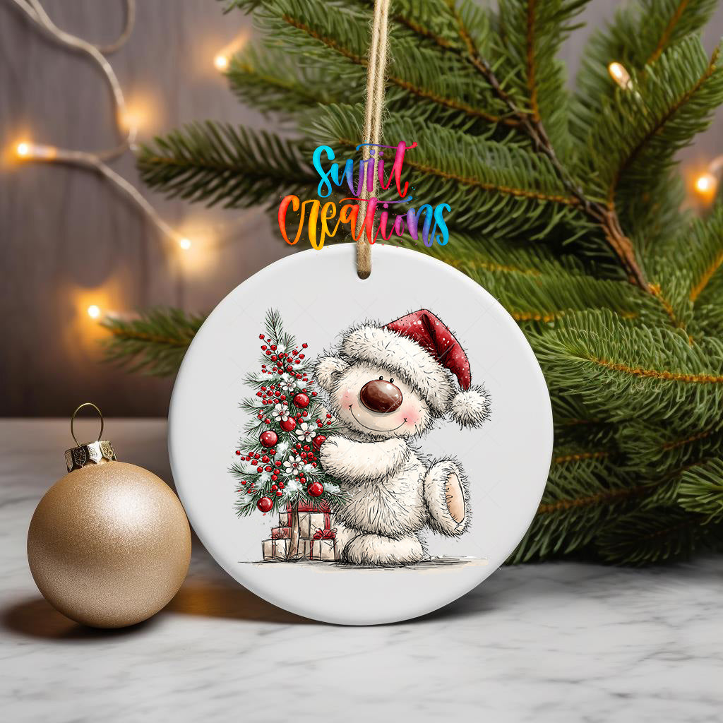 White Christmas bear ornament UV DTF transfer hugging a red berry decorated tree, mockup view 3