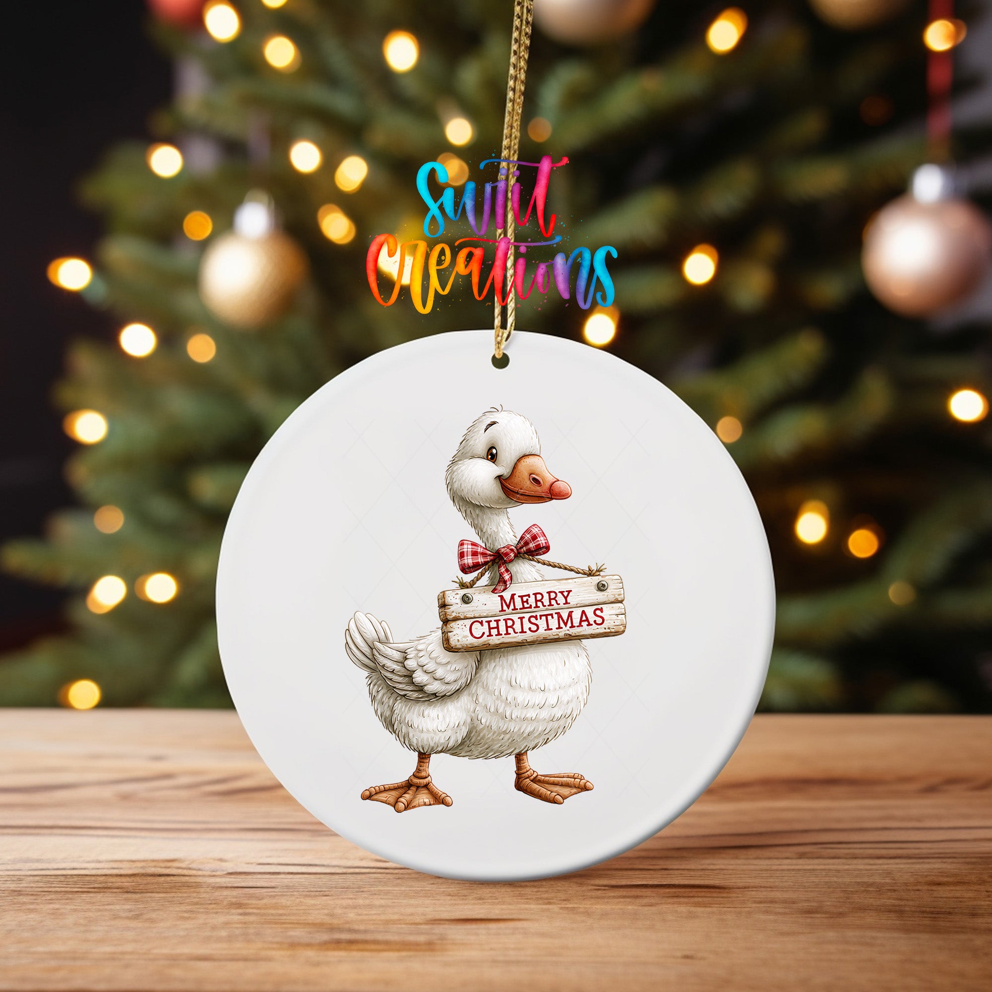 Christmas goose ornament UV DTF transfer with red plaid bow and Merry Christmas sign, mockup view 4