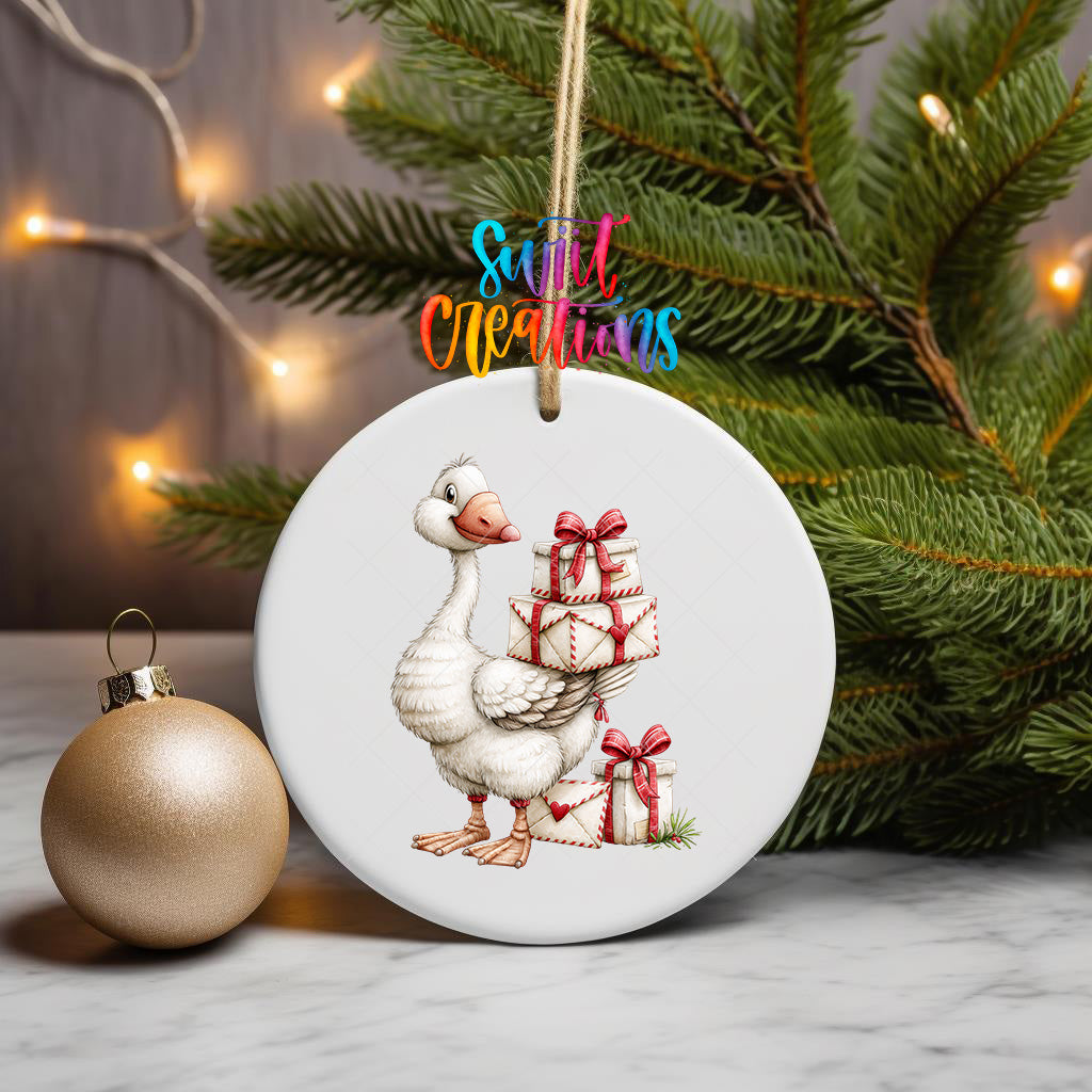 Christmas goose ornament UV DTF transfer carrying cream gifts tied with red bows, mockup view 3