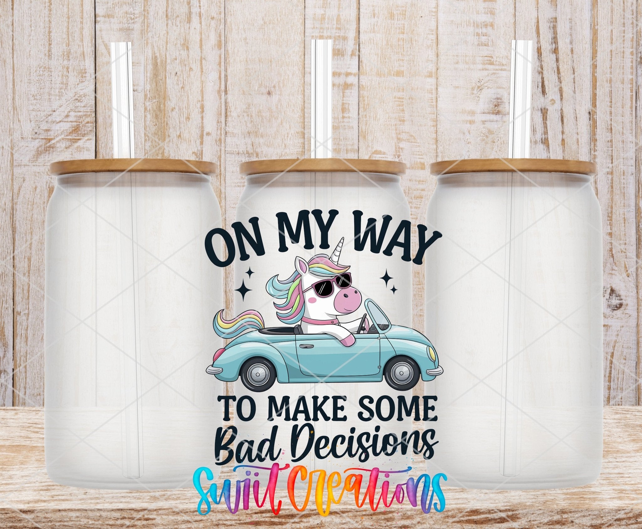 On My Way To Make Some Bad Decisions Unicorn UV DTF transfer applied to a clear glass can set from Swiit Creations