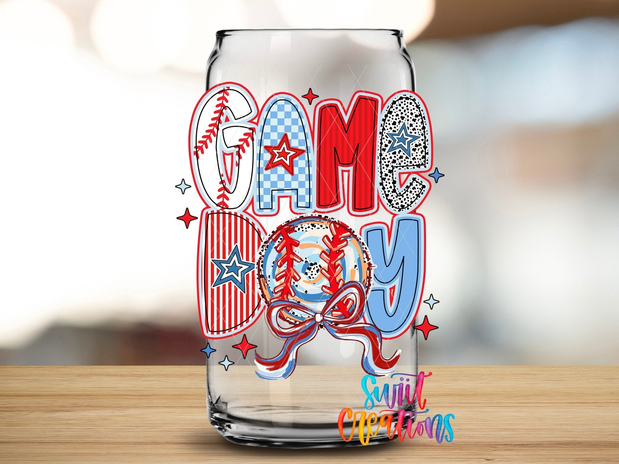 Red White and Blue Game Day Baseball UV DTF transfer applied to a clear glass can from Swiit Creations