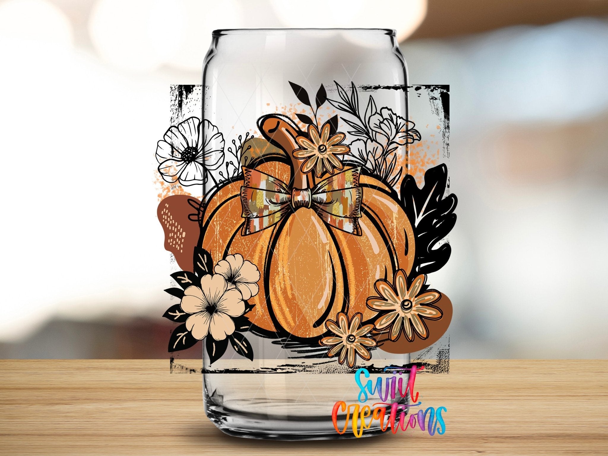 Retro Boho Pumpkin UV DTF transfer applied to a clear glass can from Swiit Creations