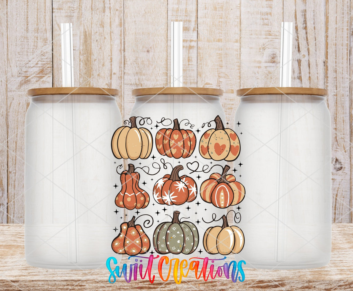Retro Pumpkin UV DTF transfer applied to a clear glass can set from Swiit Creations