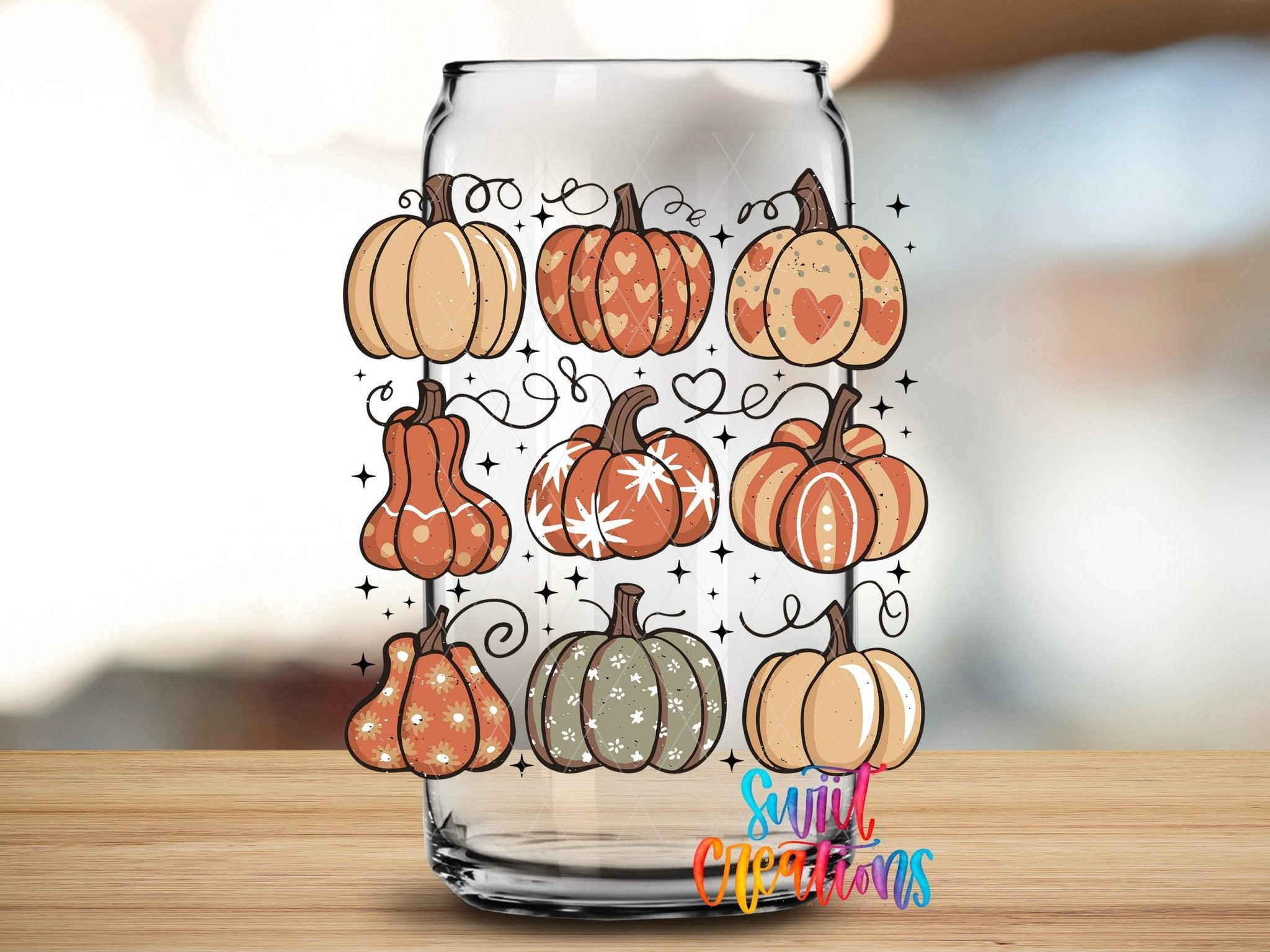 Retro Pumpkin UV DTF transfer applied to a clear glass can from Swiit Creations