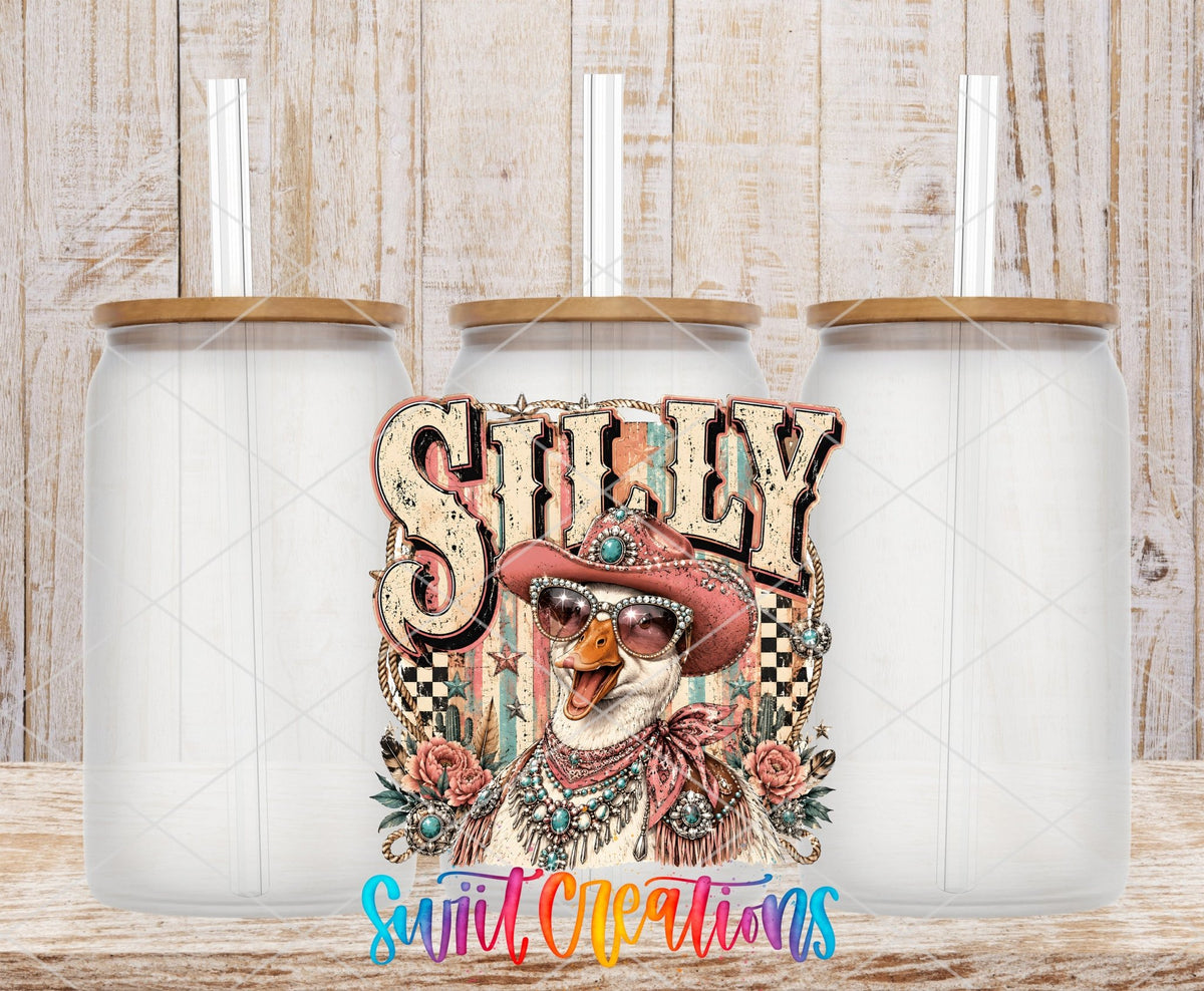 Silly Goose Western Goose UV DTF transfer applied to a clear glass can set from Swiit Creations