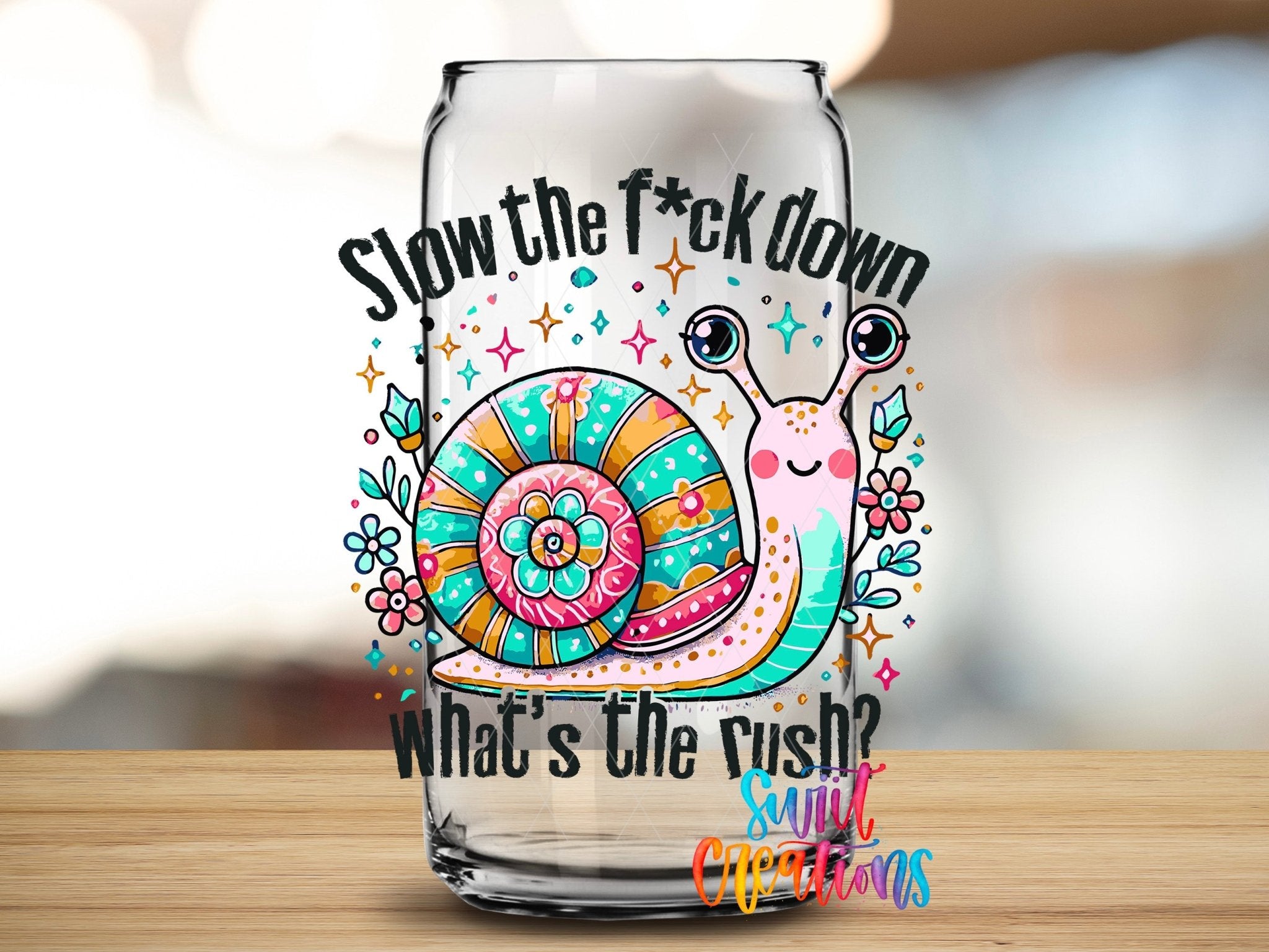 Slow The Fuck Down UV DTF transfer applied to a clear glass can from Swiit Creations