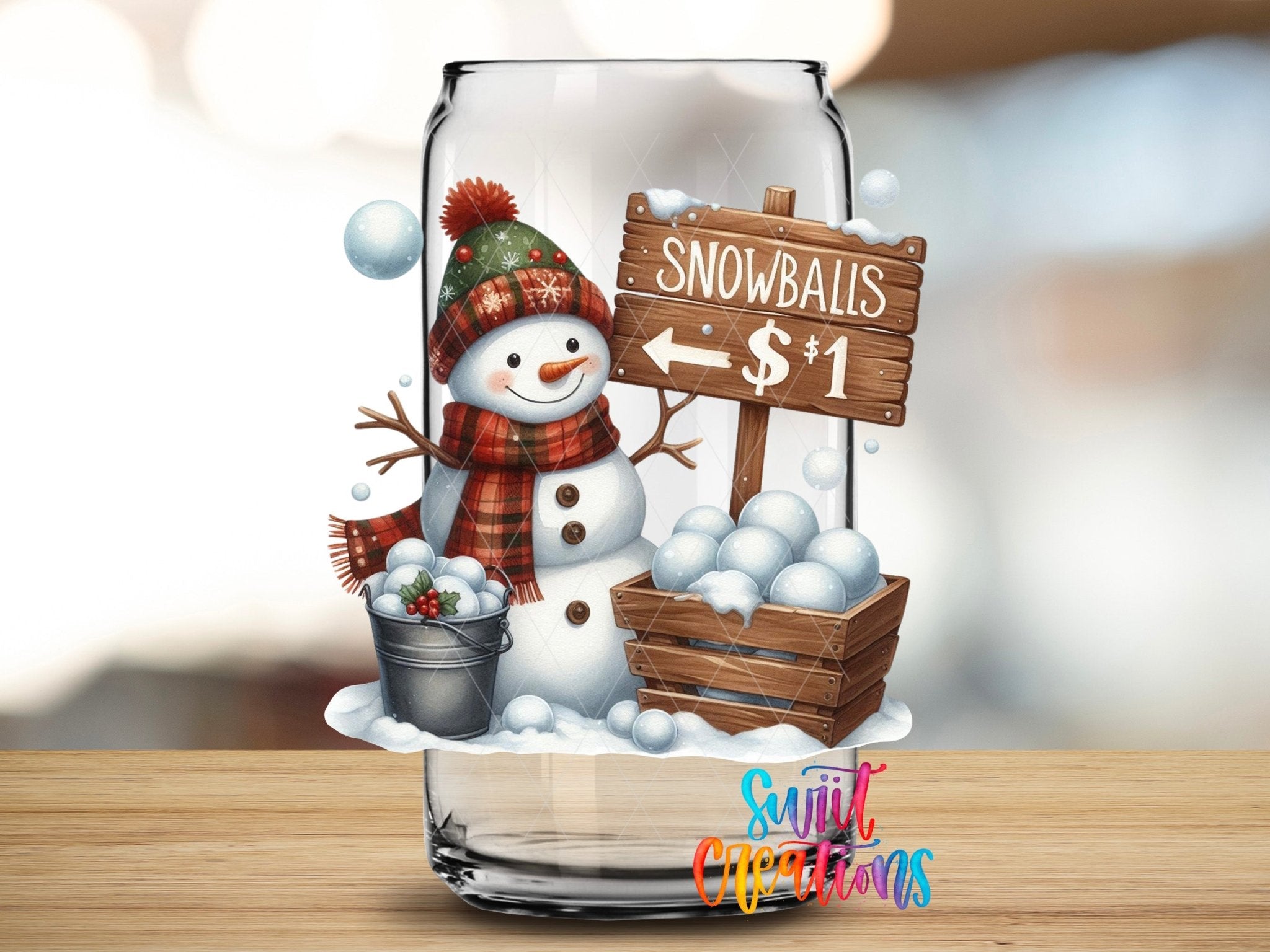Swiit Creations UV DTF Snowballs Snowman Christmas transfer applied to a clear glass can