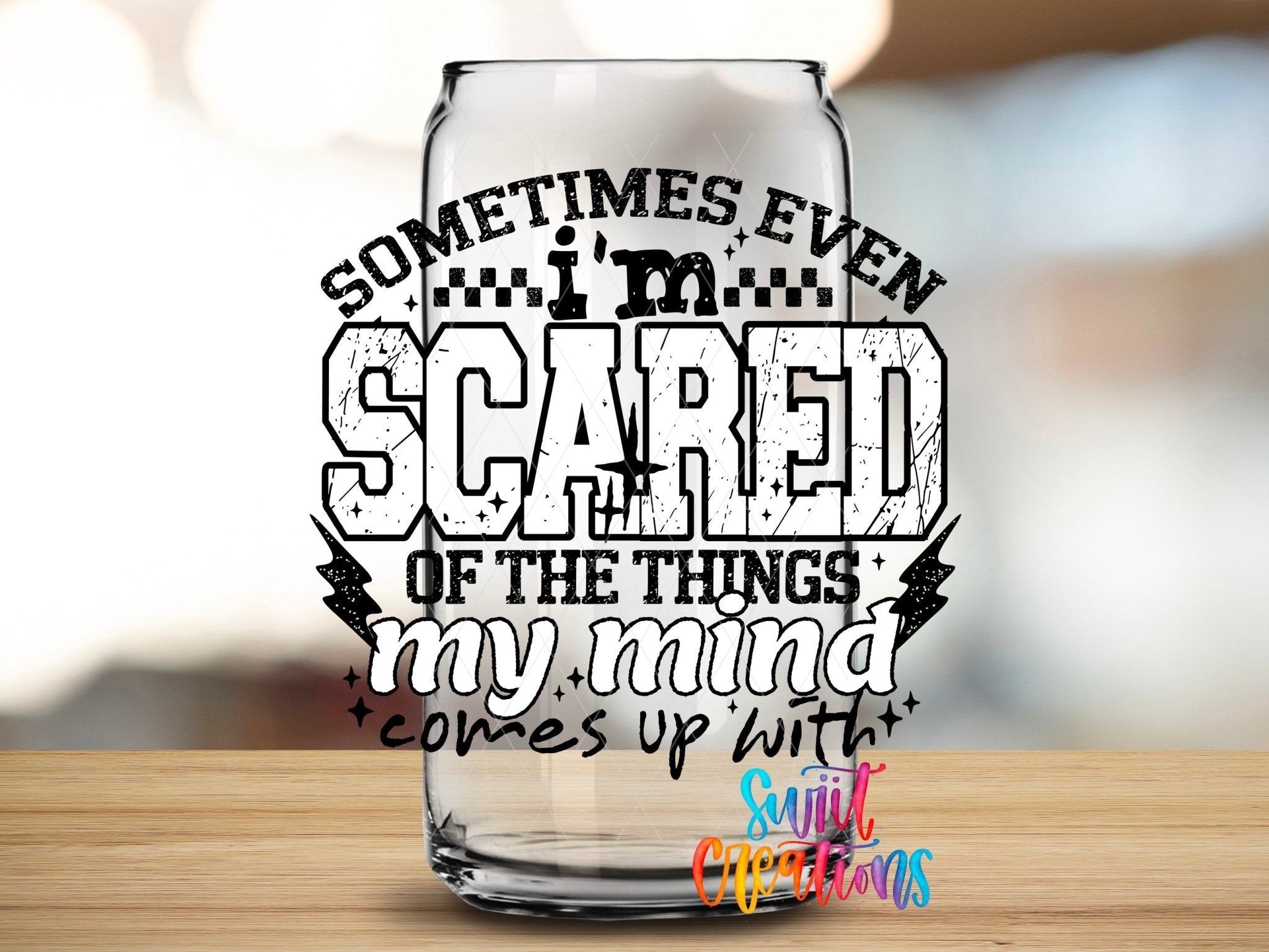 Sometimes Even I’m Scared UV DTF transfer applied to a clear glass can from Swiit Creations