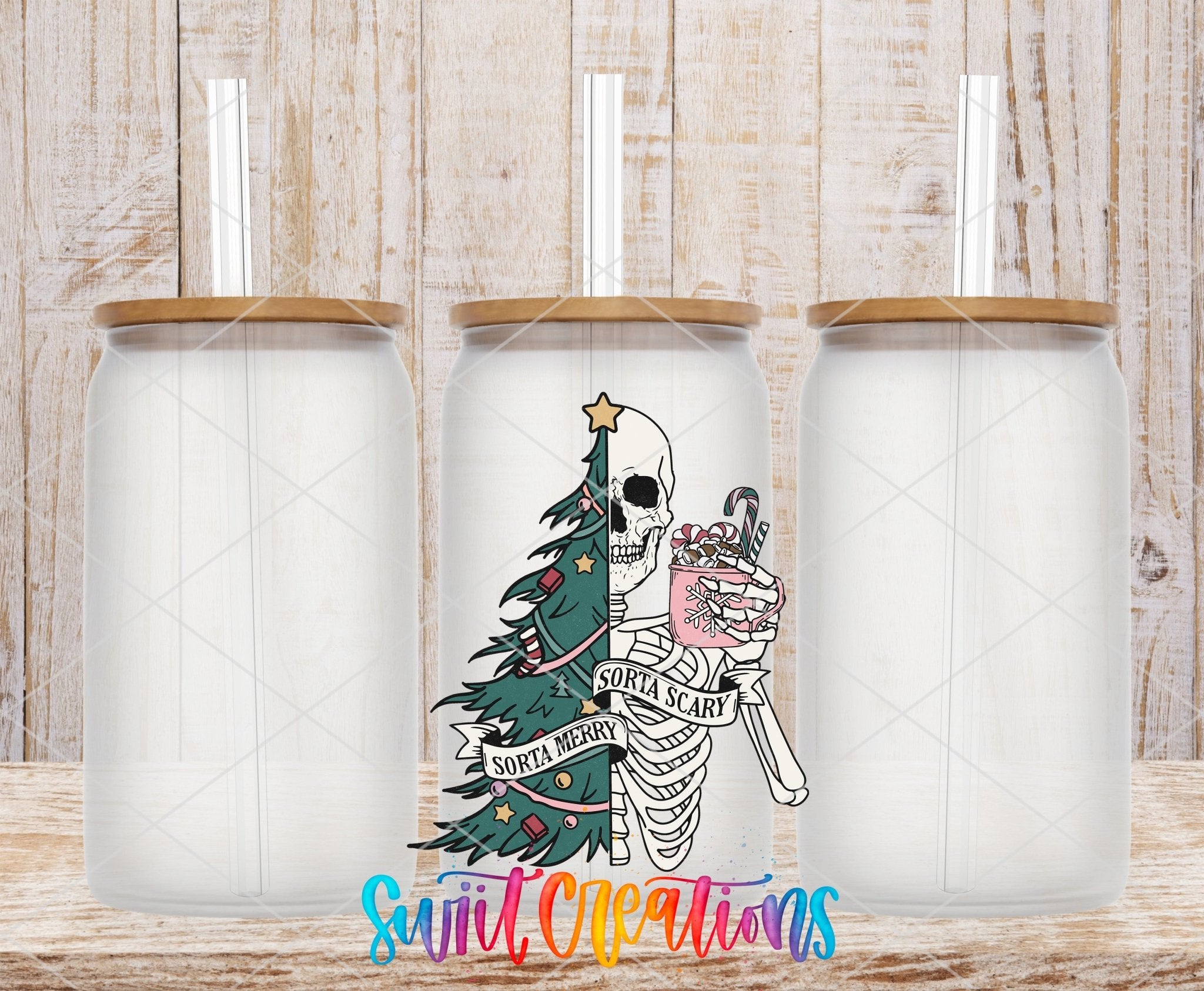 Swiit Creations UV DTF Sorta Merry Sorta Scary Skeleton Christmas transfer shown on a clear glass can set