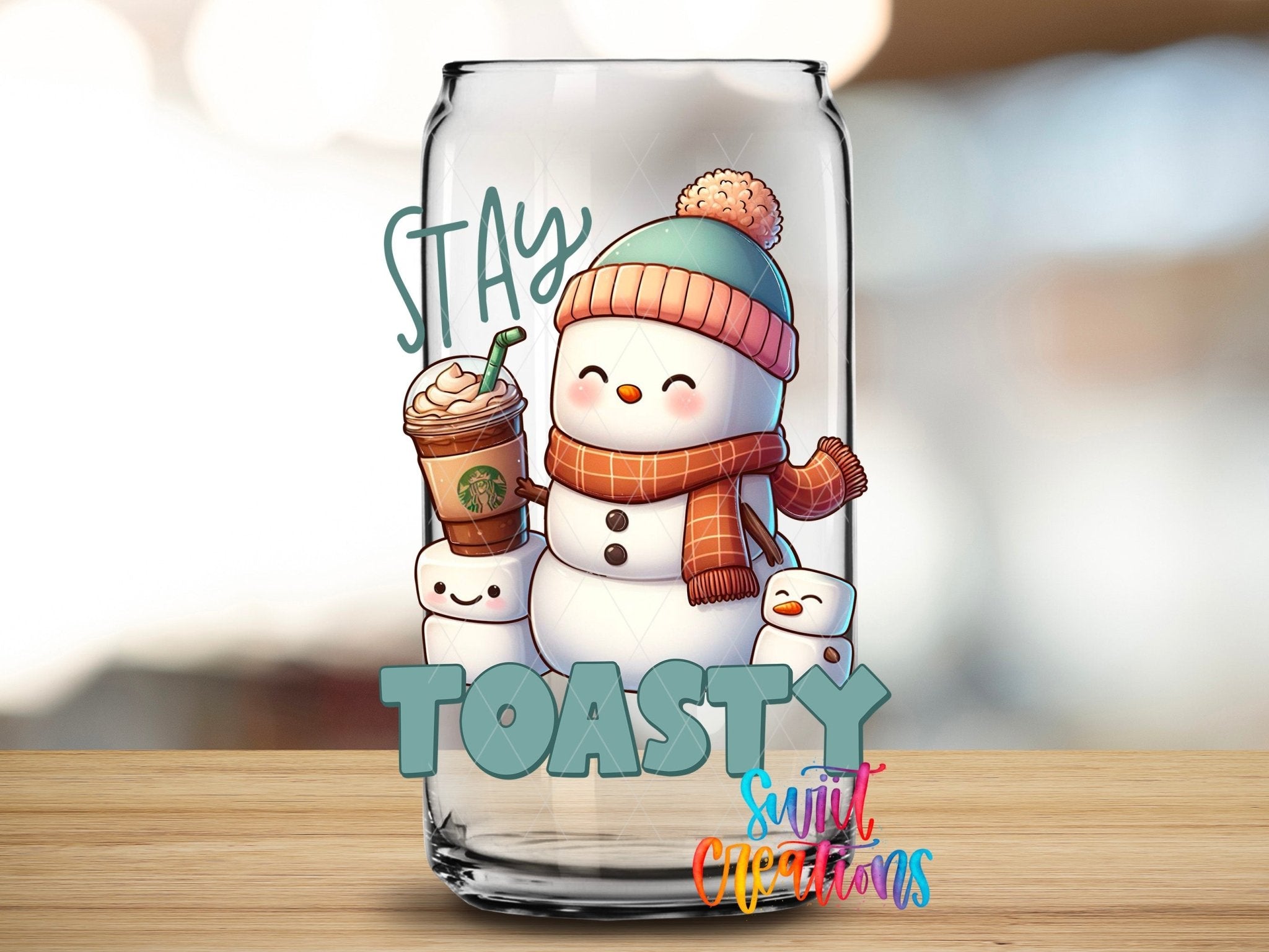 Swiit Creations UV DTF Stay Toasty Snowman Coffee Christmas transfer applied to a clear glass can
