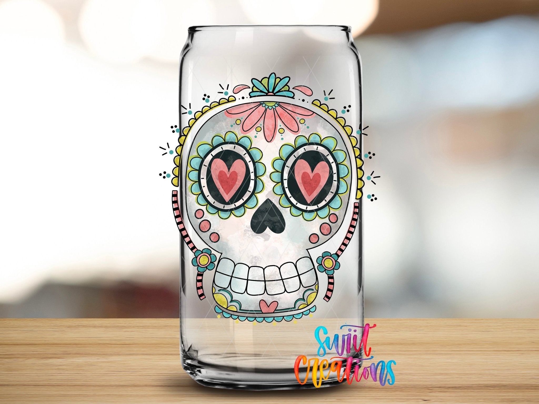 Sugar Skull Heart Eyes UV DTF transfer applied to a clear glass can from Swiit Creations