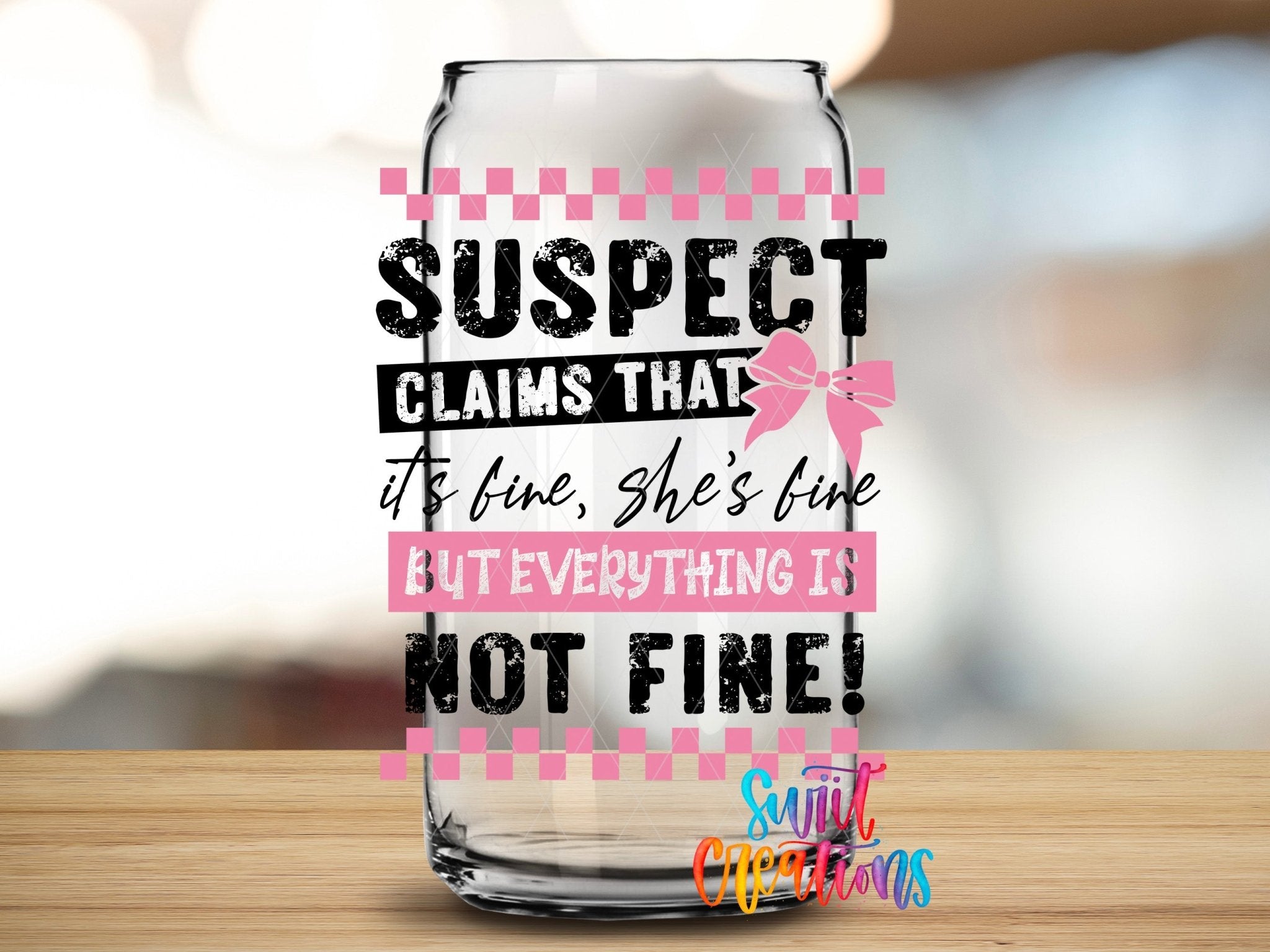 Suspect Claims She’s Fine UV DTF transfer applied to a clear glass can from Swiit Creations