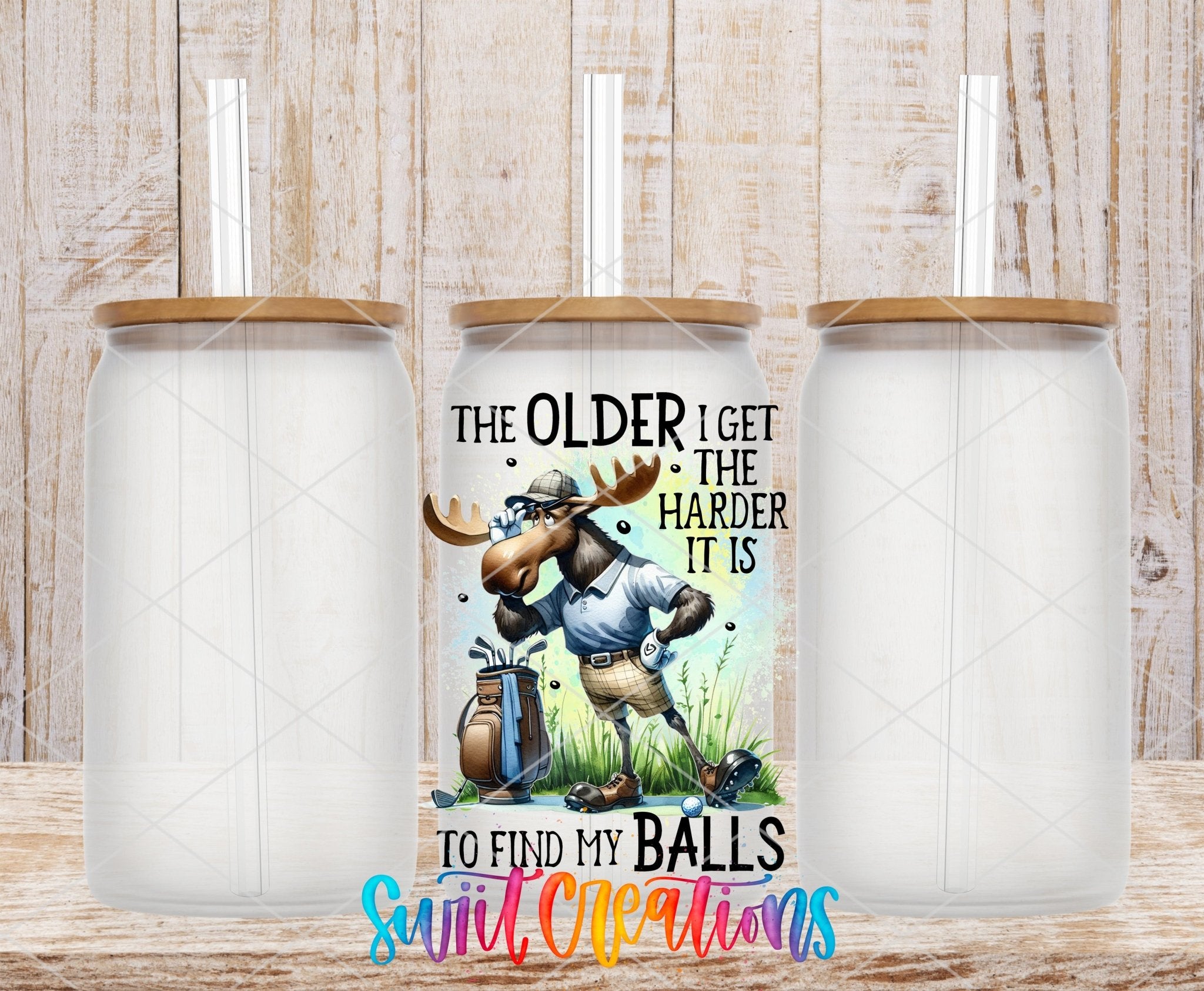 Swiit Creations UV DTF Older I Get Finding My Balls transfer shown on a clear glass can set