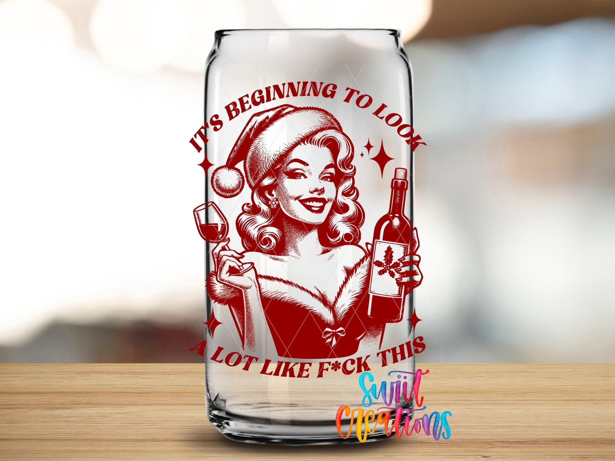 Swiit Creations UV DTF This Christmas Wine Lady transfer applied to a clear glass can