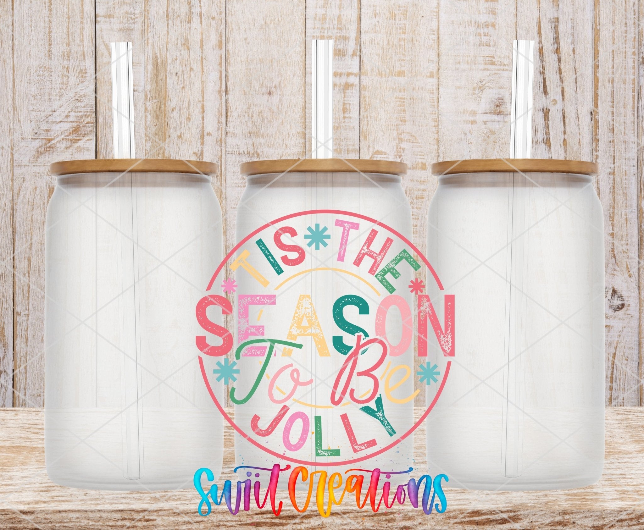 Swiit Creations UV DTF Tis the Season to Be Jolly Christmas transfer shown on a clear glass can set