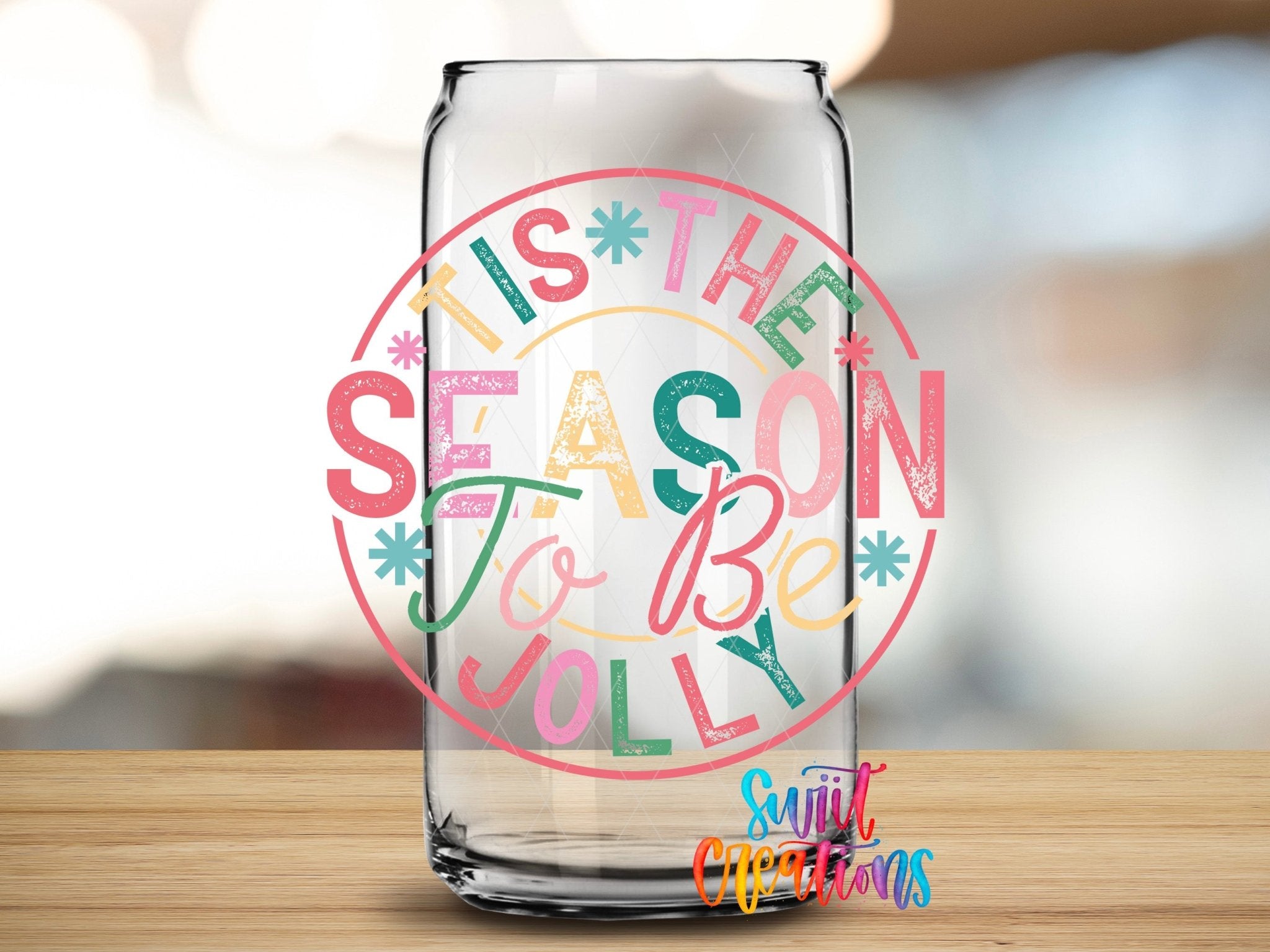 Swiit Creations UV DTF Tis the Season to Be Jolly Christmas transfer applied to a clear glass can