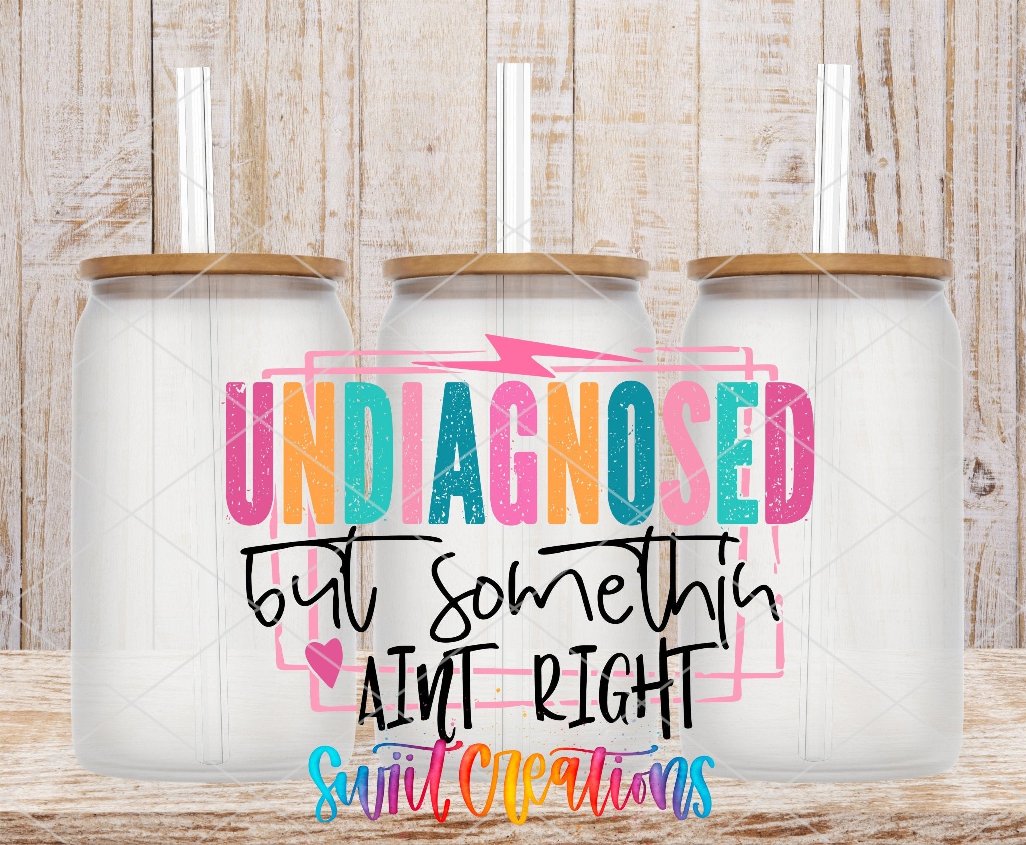 Undiagnosed But Somethin' Ain't Right UV DTF transfer applied to a clear glass can set from Swiit Creations