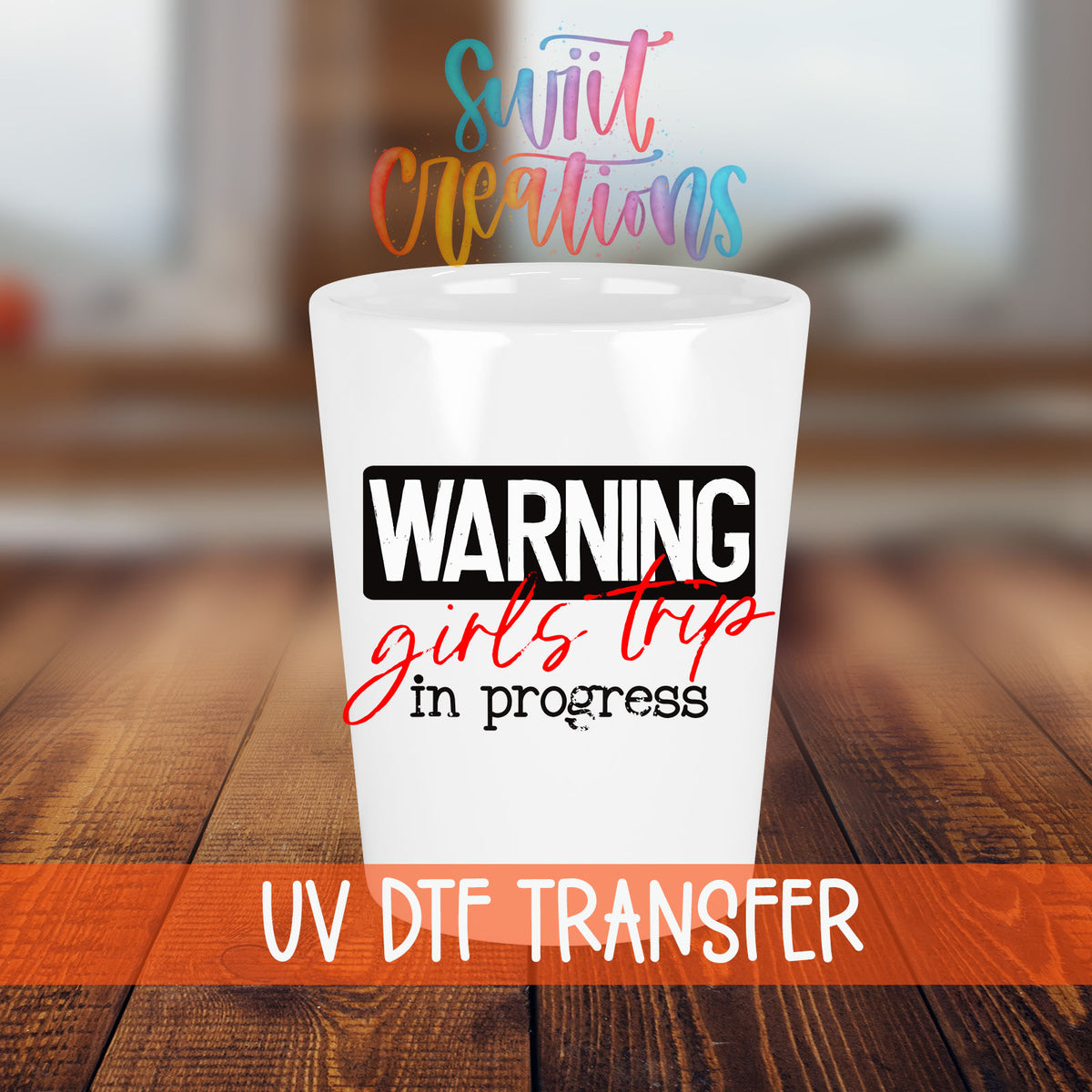 Warning Girls Trip in Progress shot glass transfer on a white shot glass on a wooden table