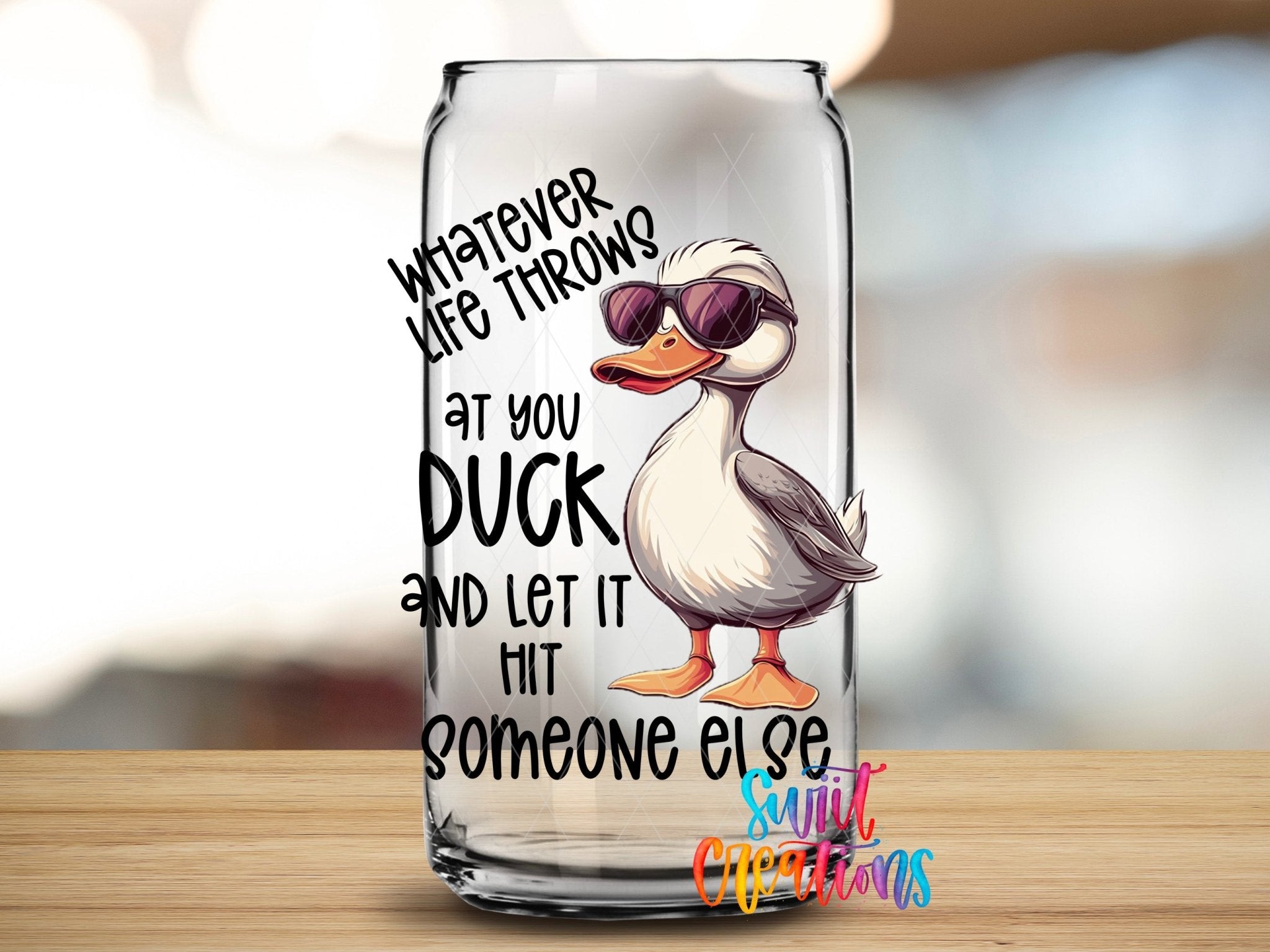 Whatever Life Throws At You UV DTF transfer applied to a clear glass can from Swiit Creations