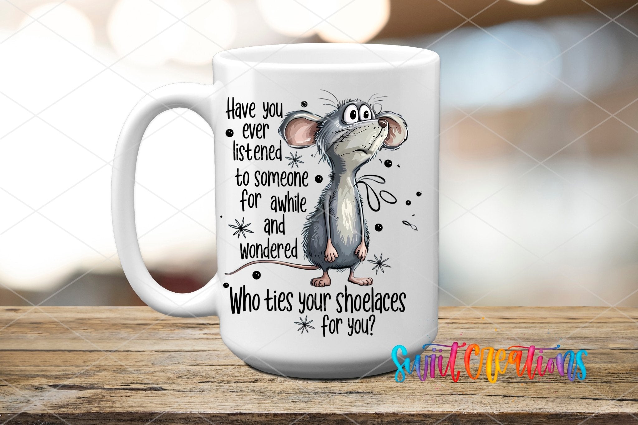 Who Ties Your Shoelaces UV DTF transfer displayed on a white ceramic mug from Swiit Creations