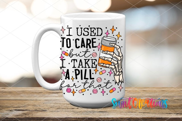 a coffee mug with the words i used to care and i take a pill