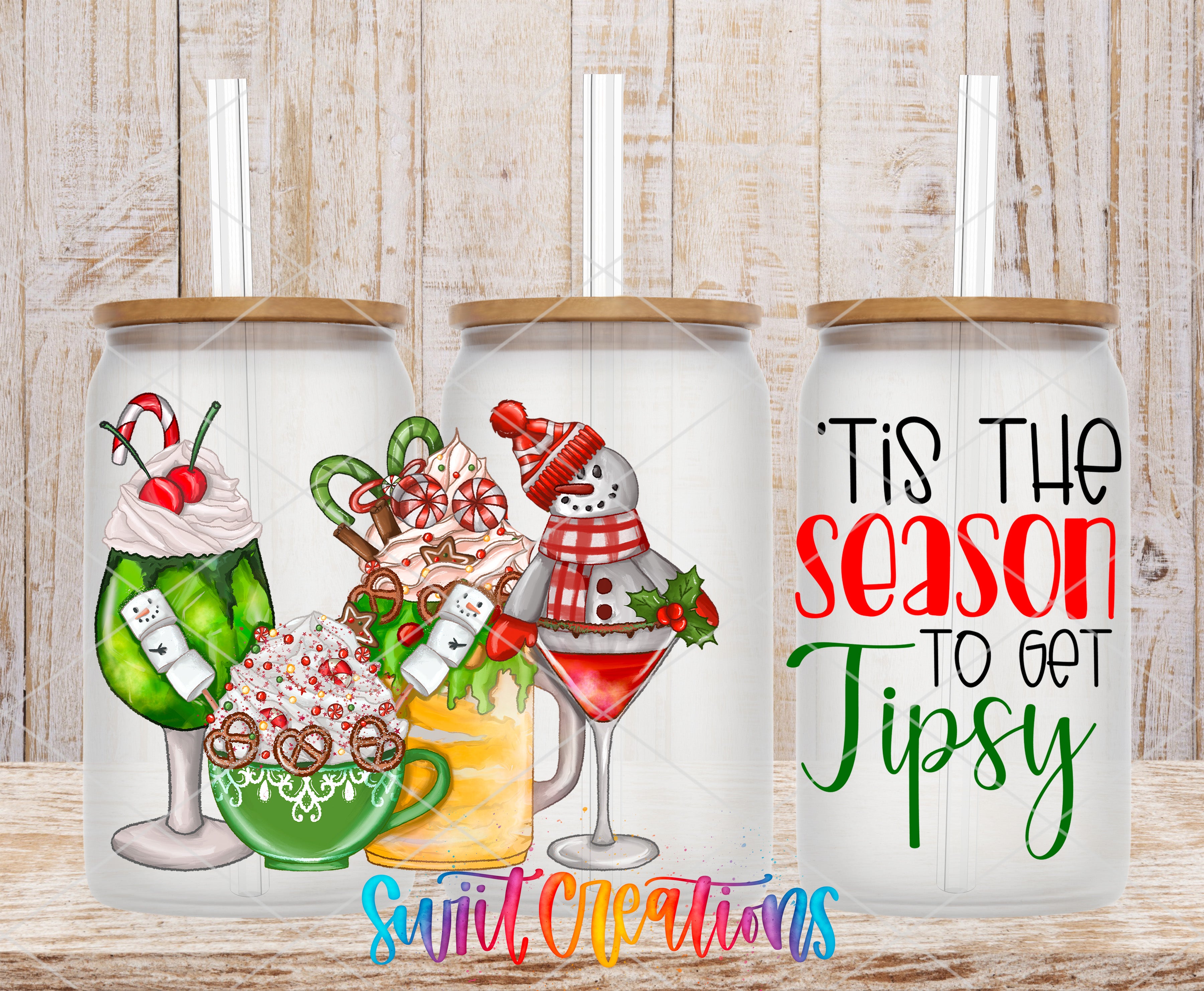 a couple of cups with christmas decorations on them