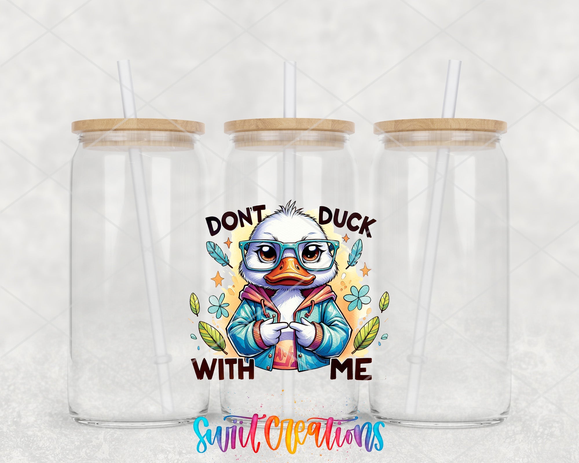 a couple of tumblers with a cartoon duck on them