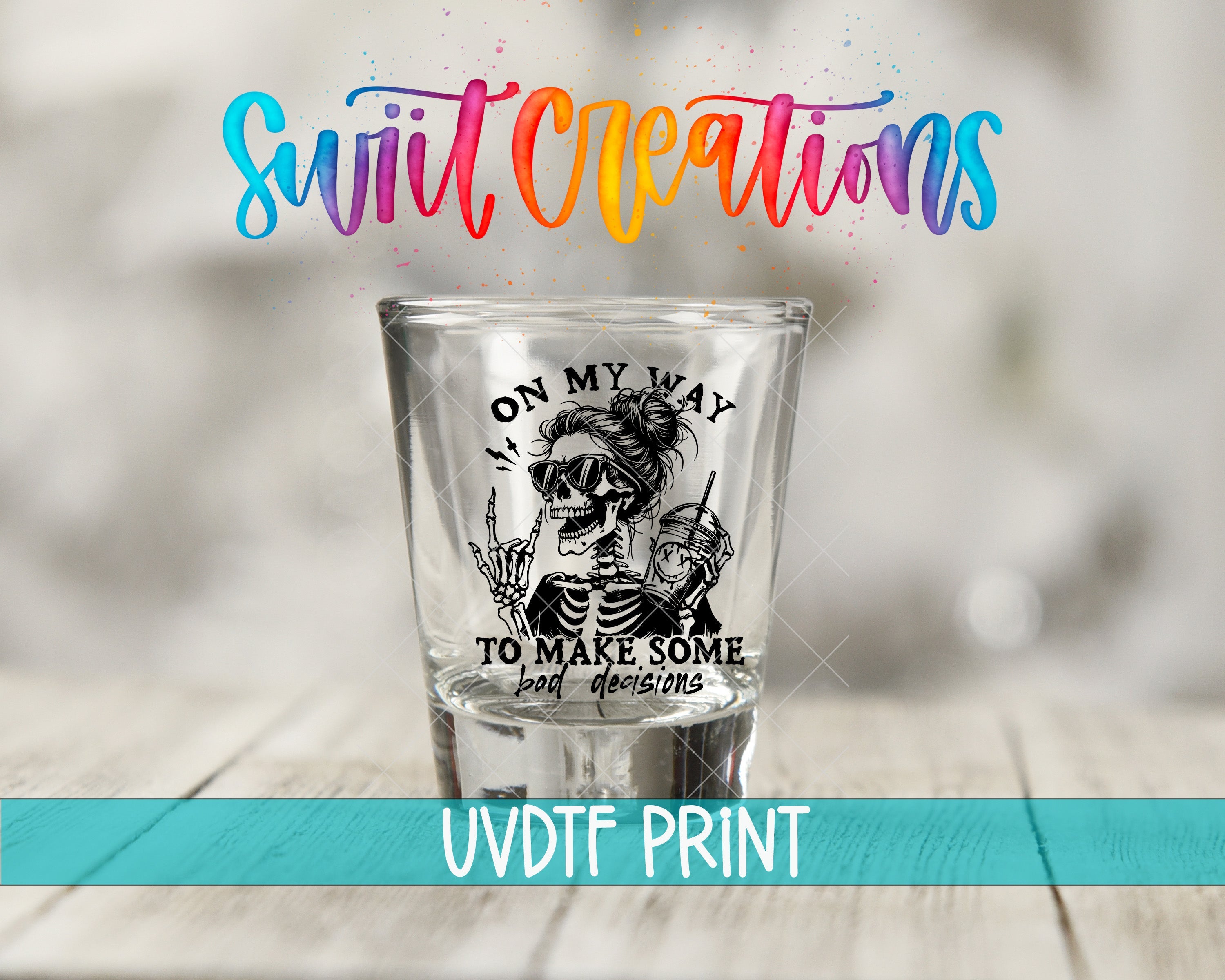 a shot glass sitting on top of a wooden table