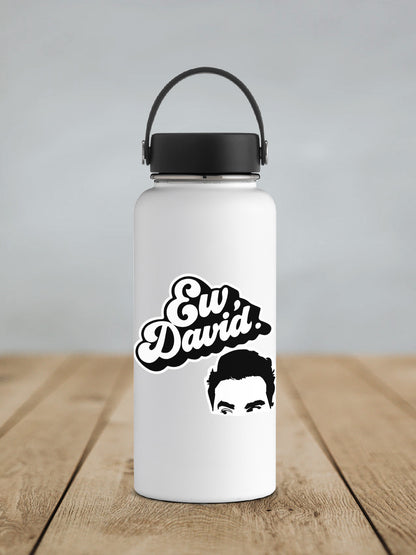 a white water bottle with a picture of a man's face on it