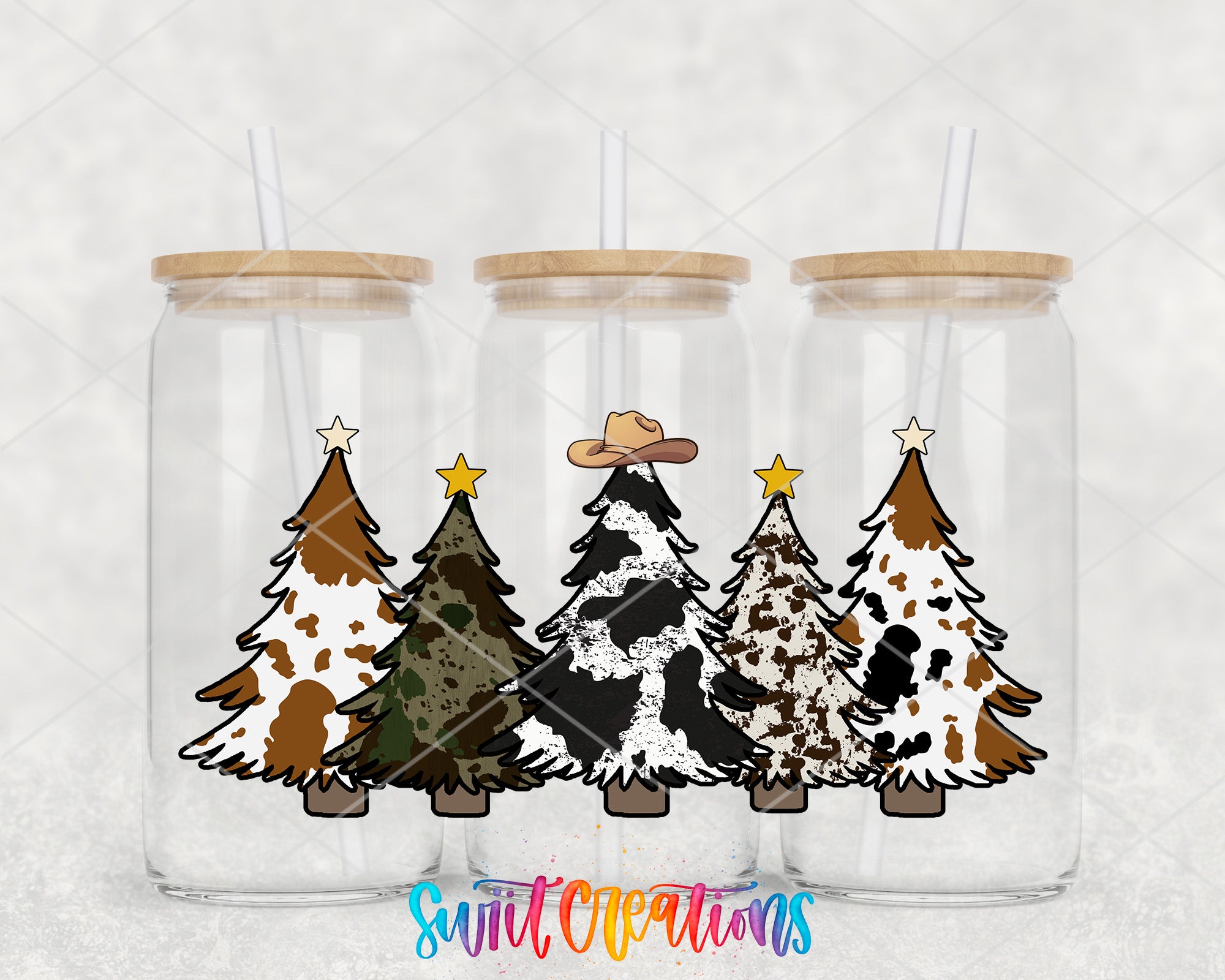 a set of three christmas trees in a jar
