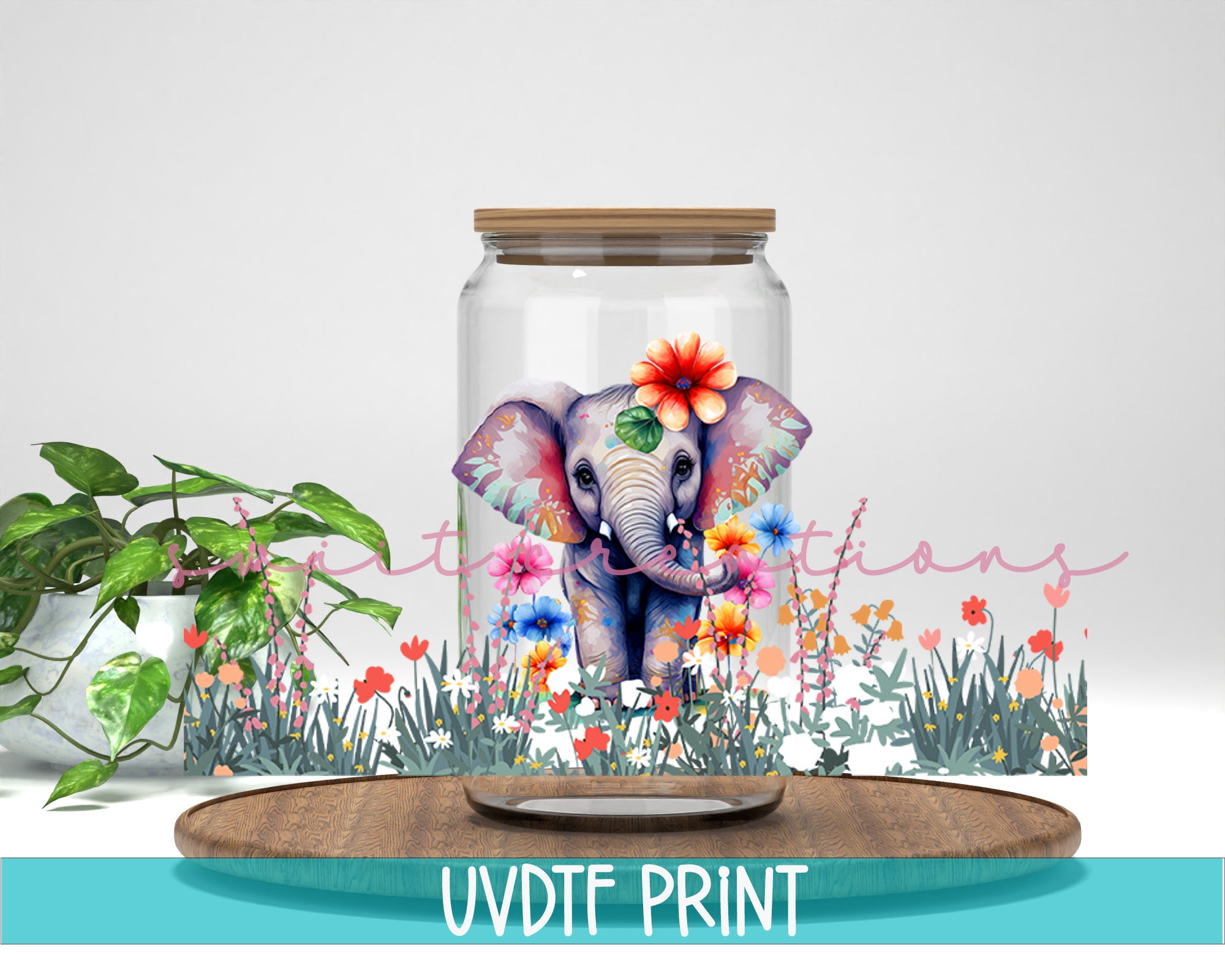 a glass jar with a picture of an elephant inside of it