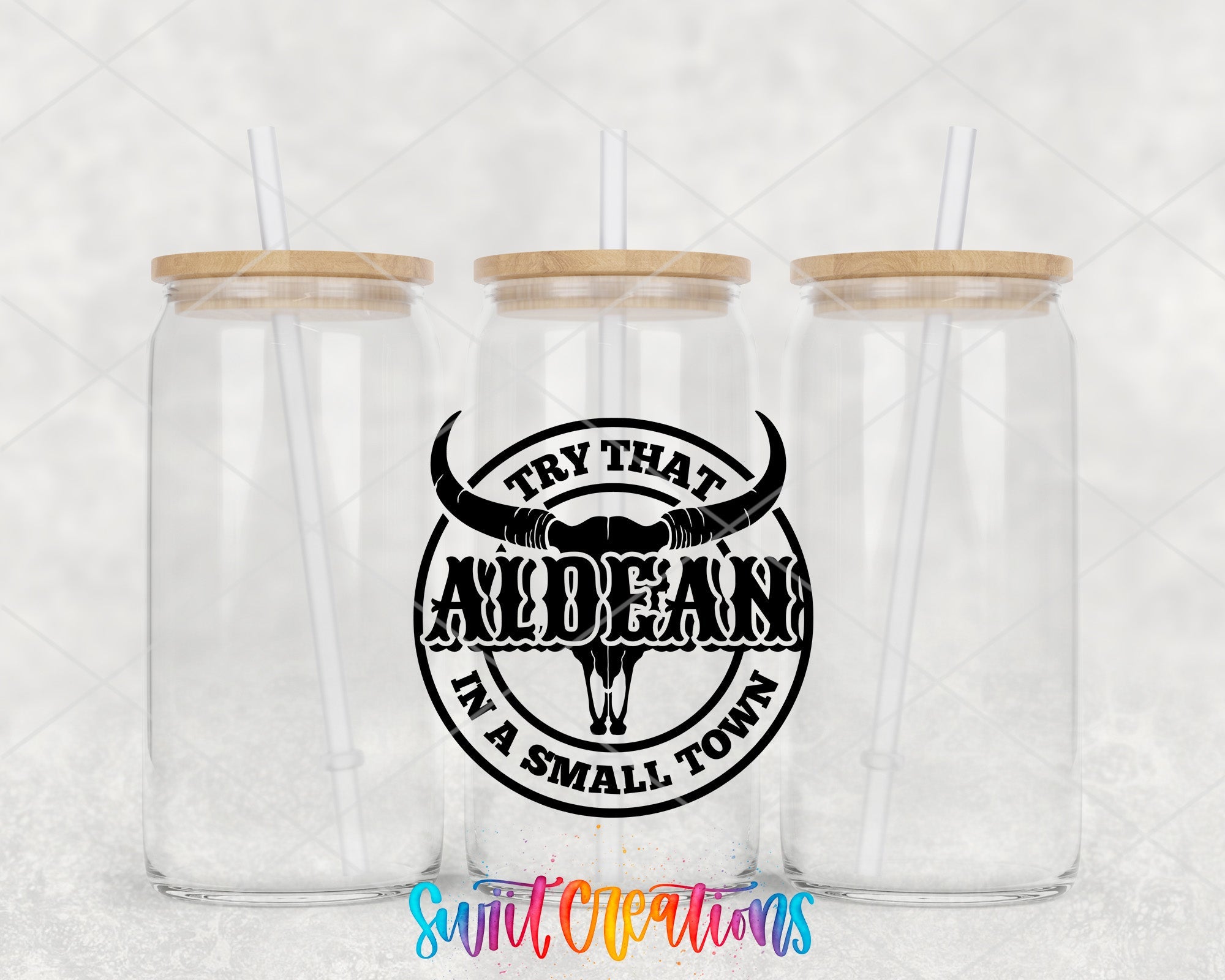 a couple of glass jars with straws in them