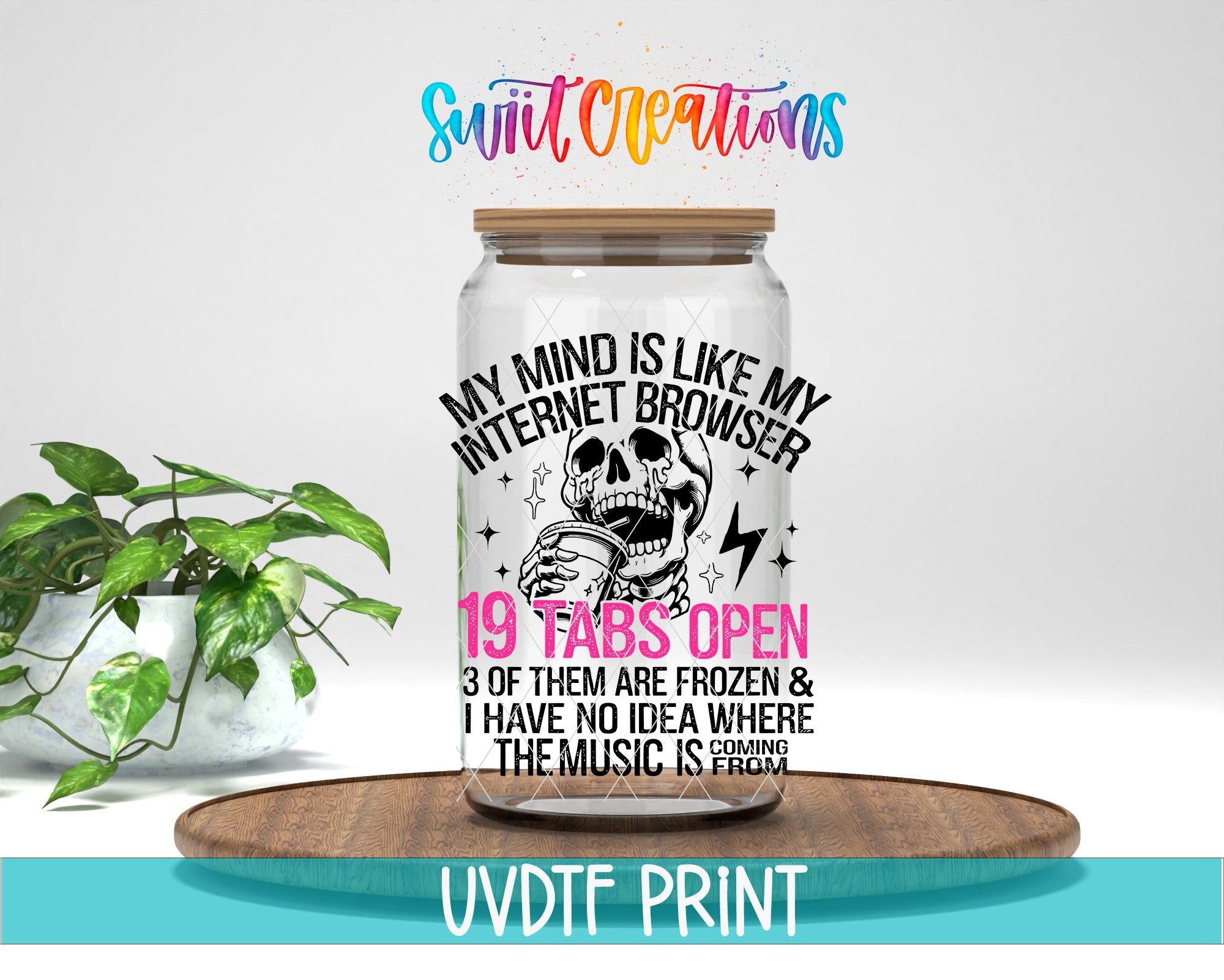 a glass jar with a label that reads "My mind is like my internet browser" and "19 tabs open", accompanied by a skull and crossbones graphic. The jar is placed on a wooden tray, and there is a potted plant in the background.