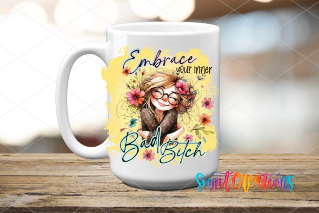 a white coffee mug with a picture of a woman on it