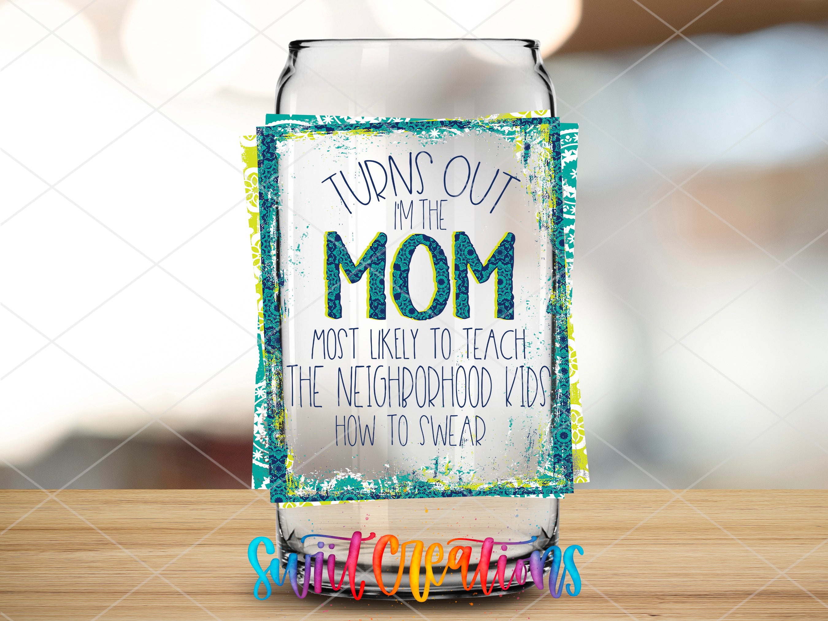 a glass jar with a message on it sitting on a table