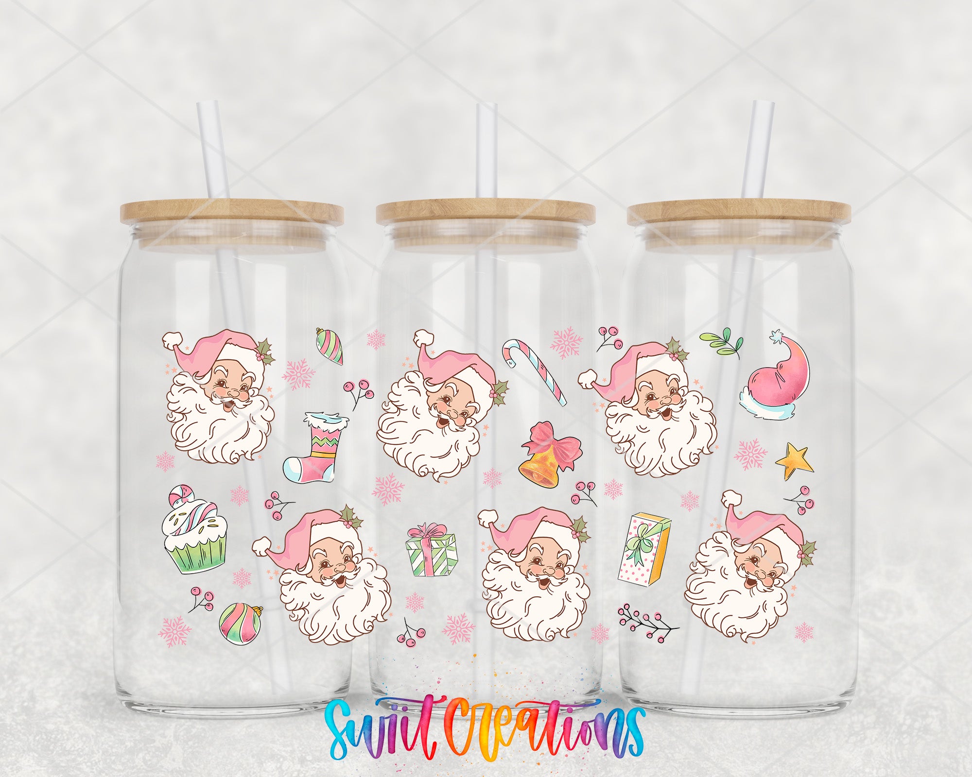 a set of three glass cups with santa claus on them