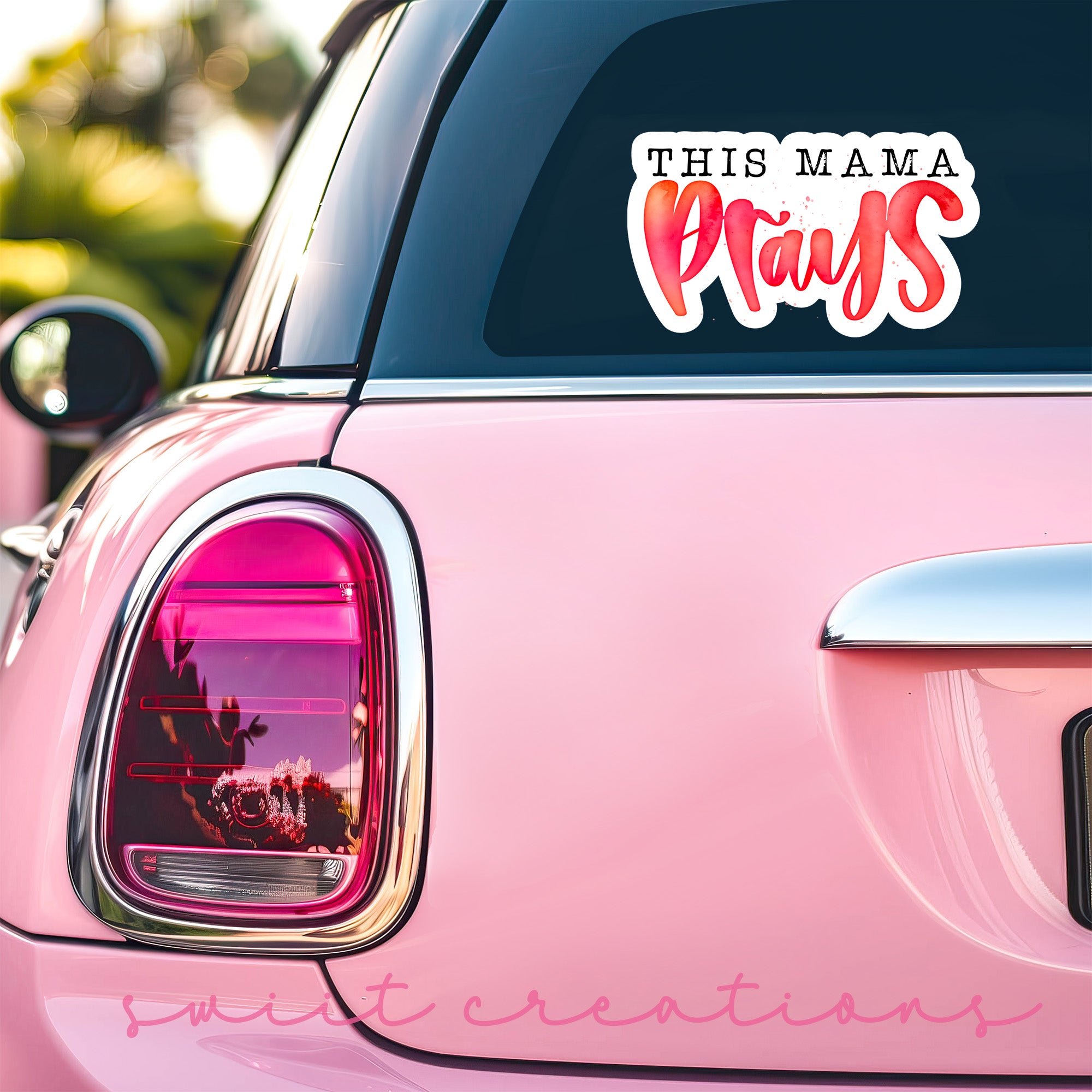 a pink car with a sticker that says this mama wants
