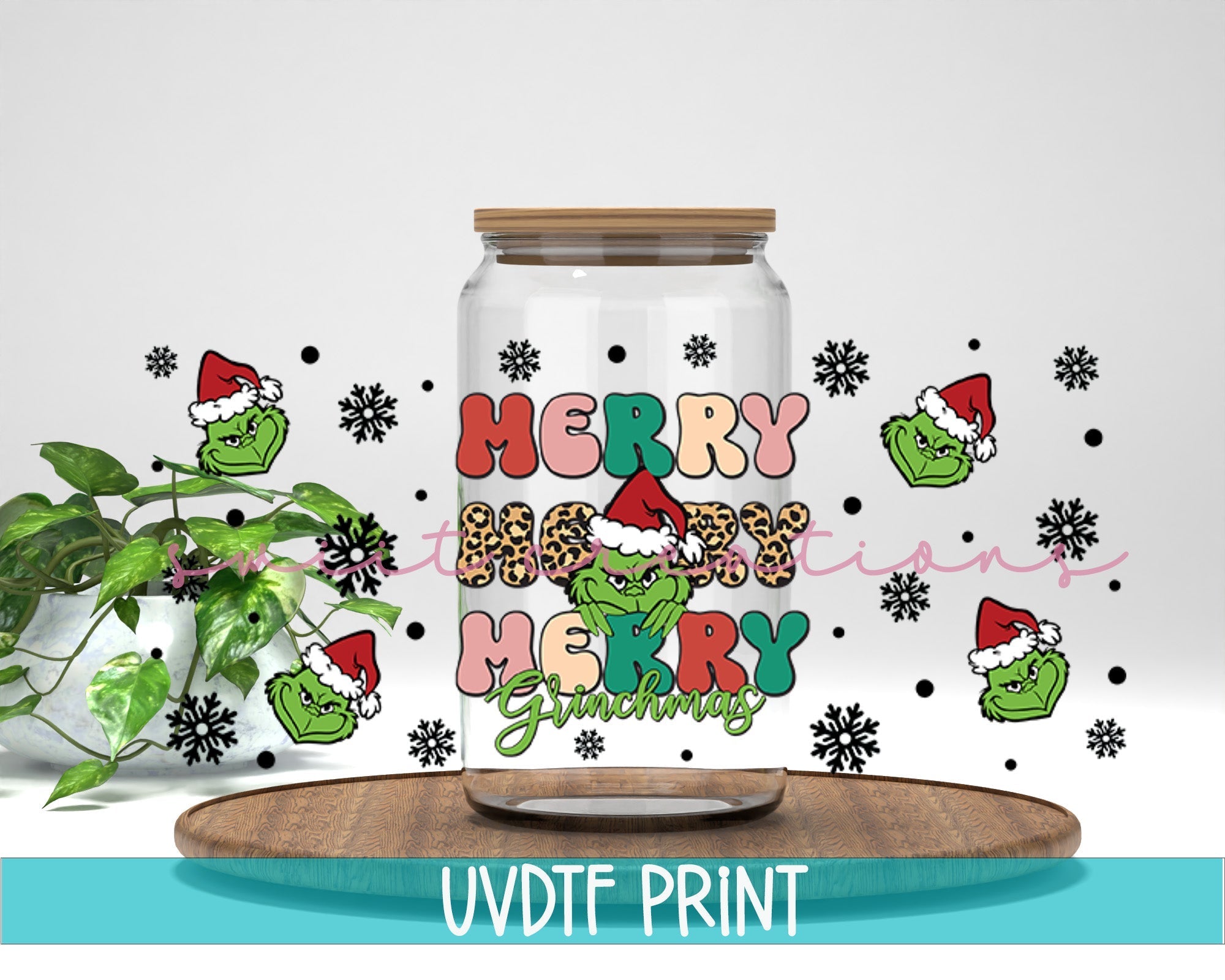 a glass jar with a christmas message on it