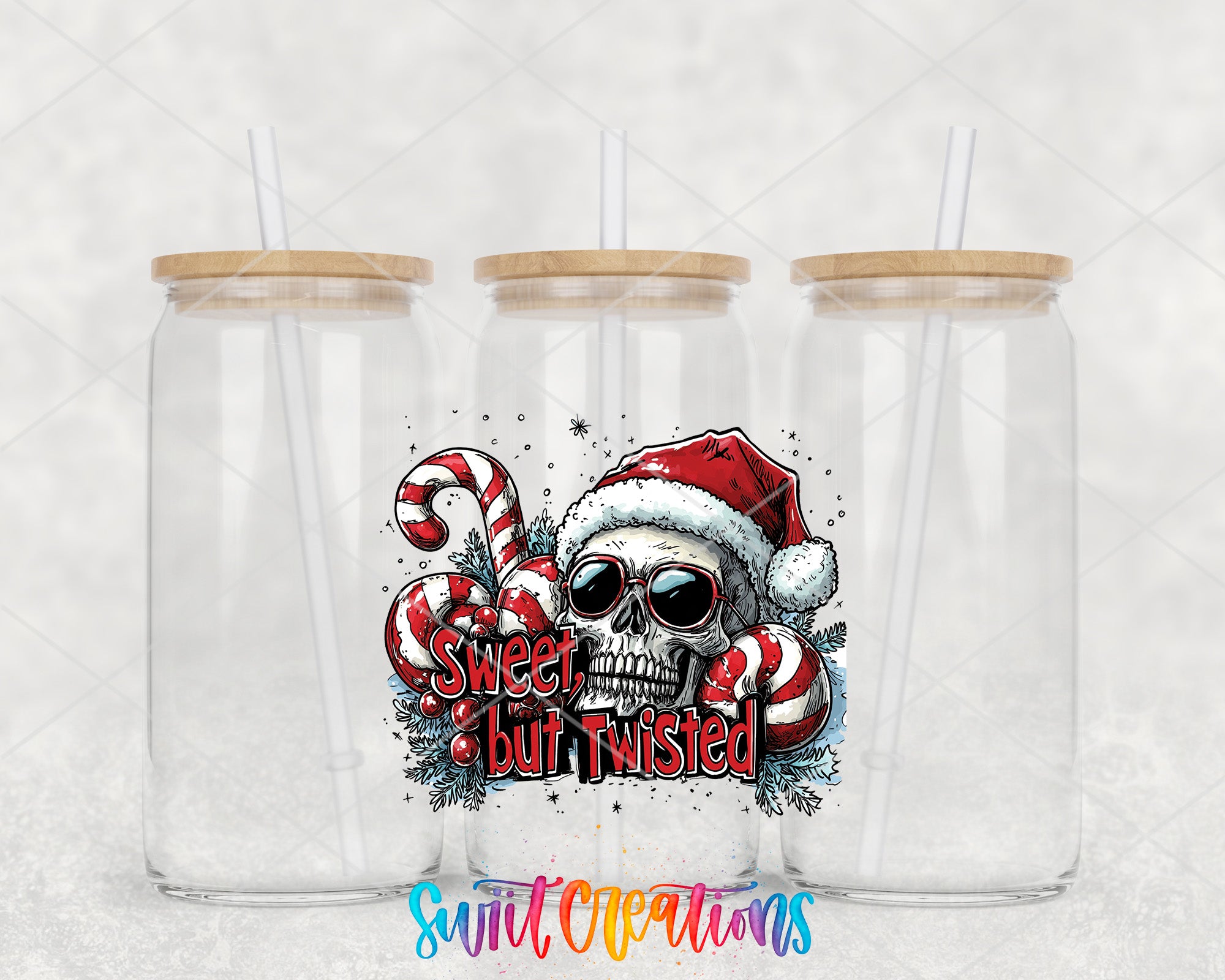 two tumblers with a skull and candy canes on them