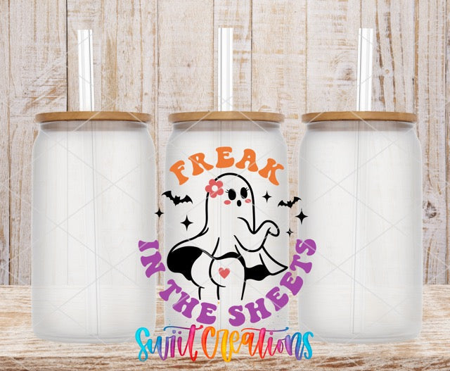 a couple of white tumbles with a ghost on them