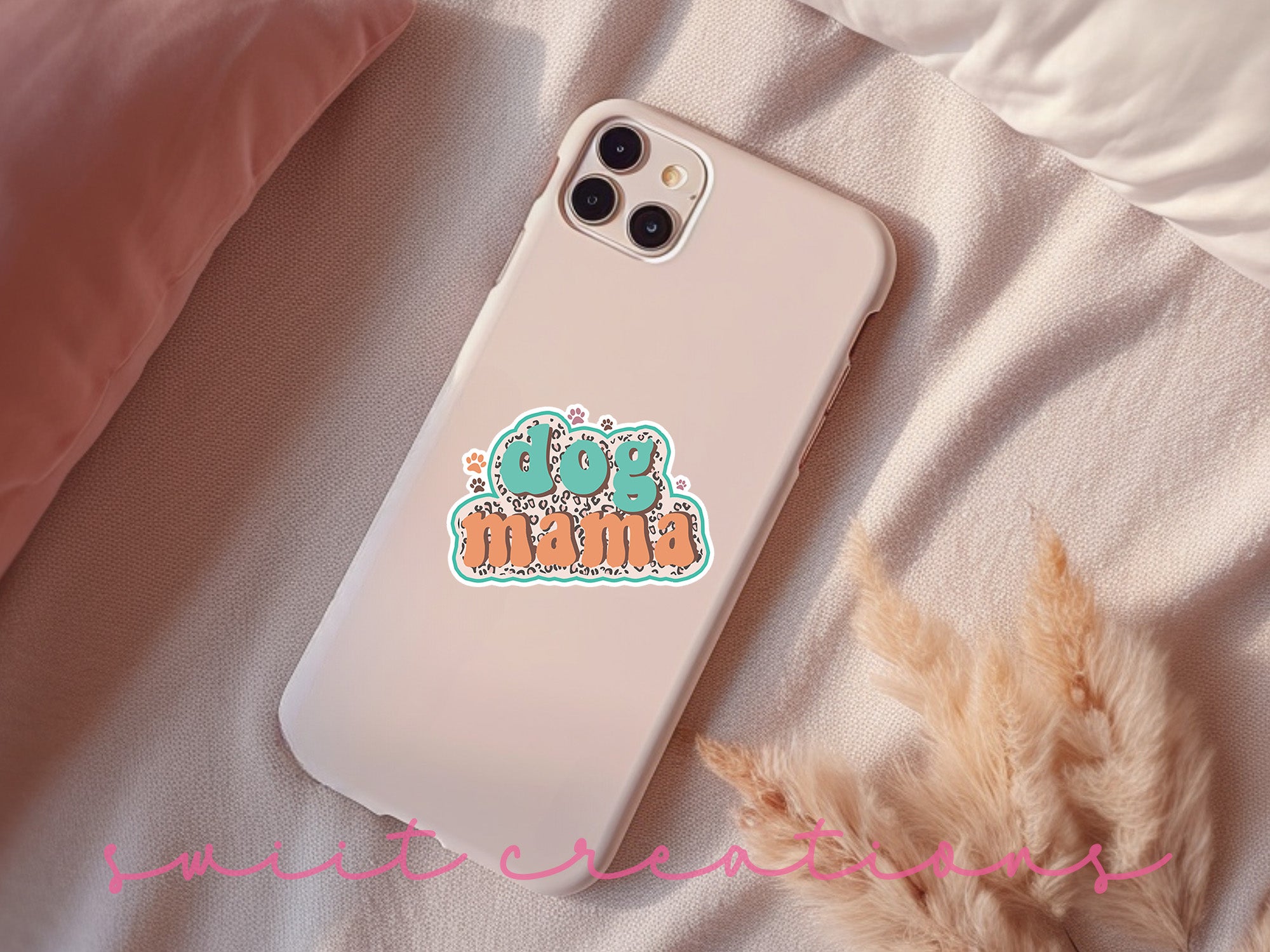 a phone case sitting on top of a bed
