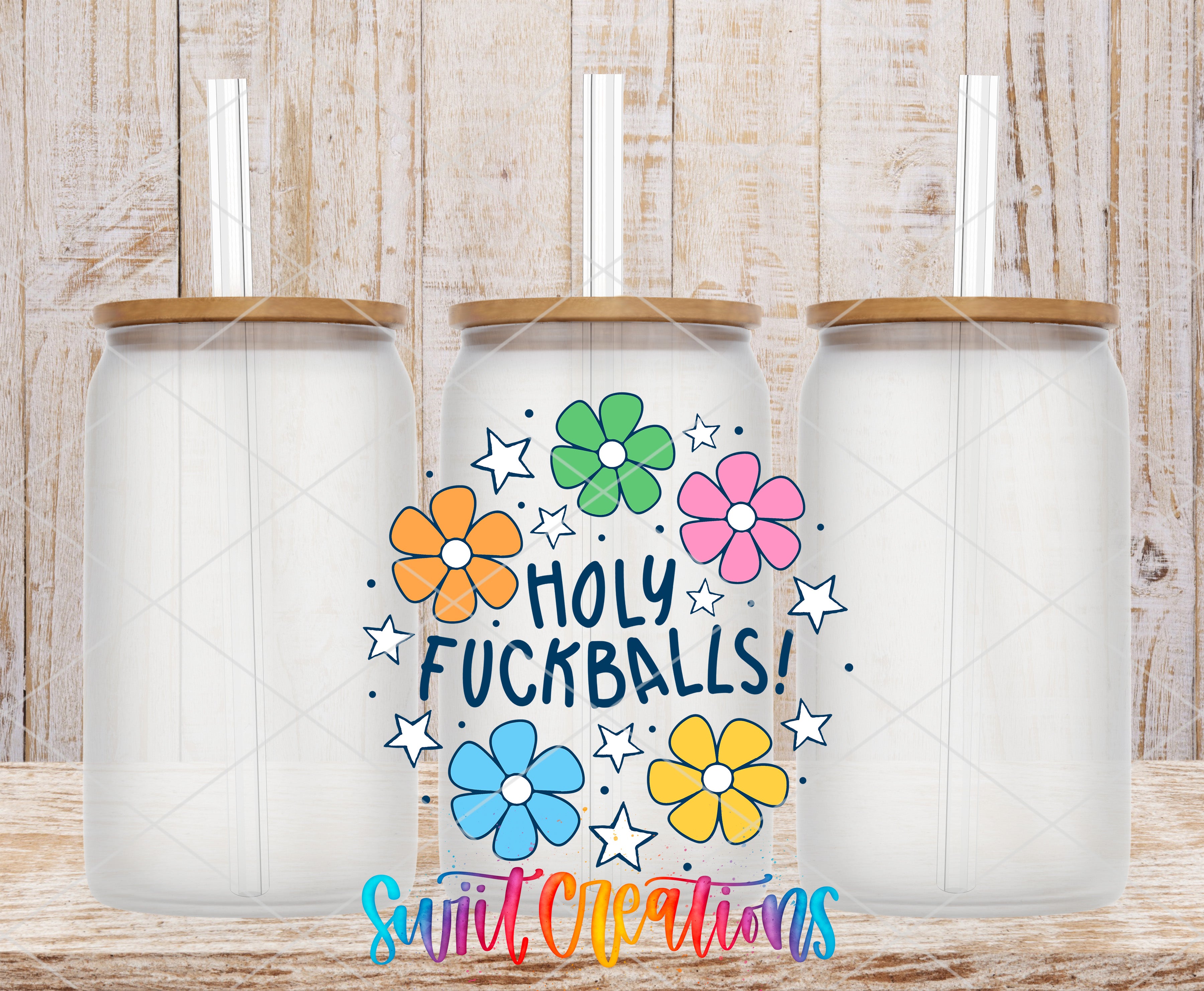three clear glass jars with lids, each containing a straw. The jars are arranged in a row, and there is a colorful design on the front of one of the jars that says "HOLY FUCKballs!"