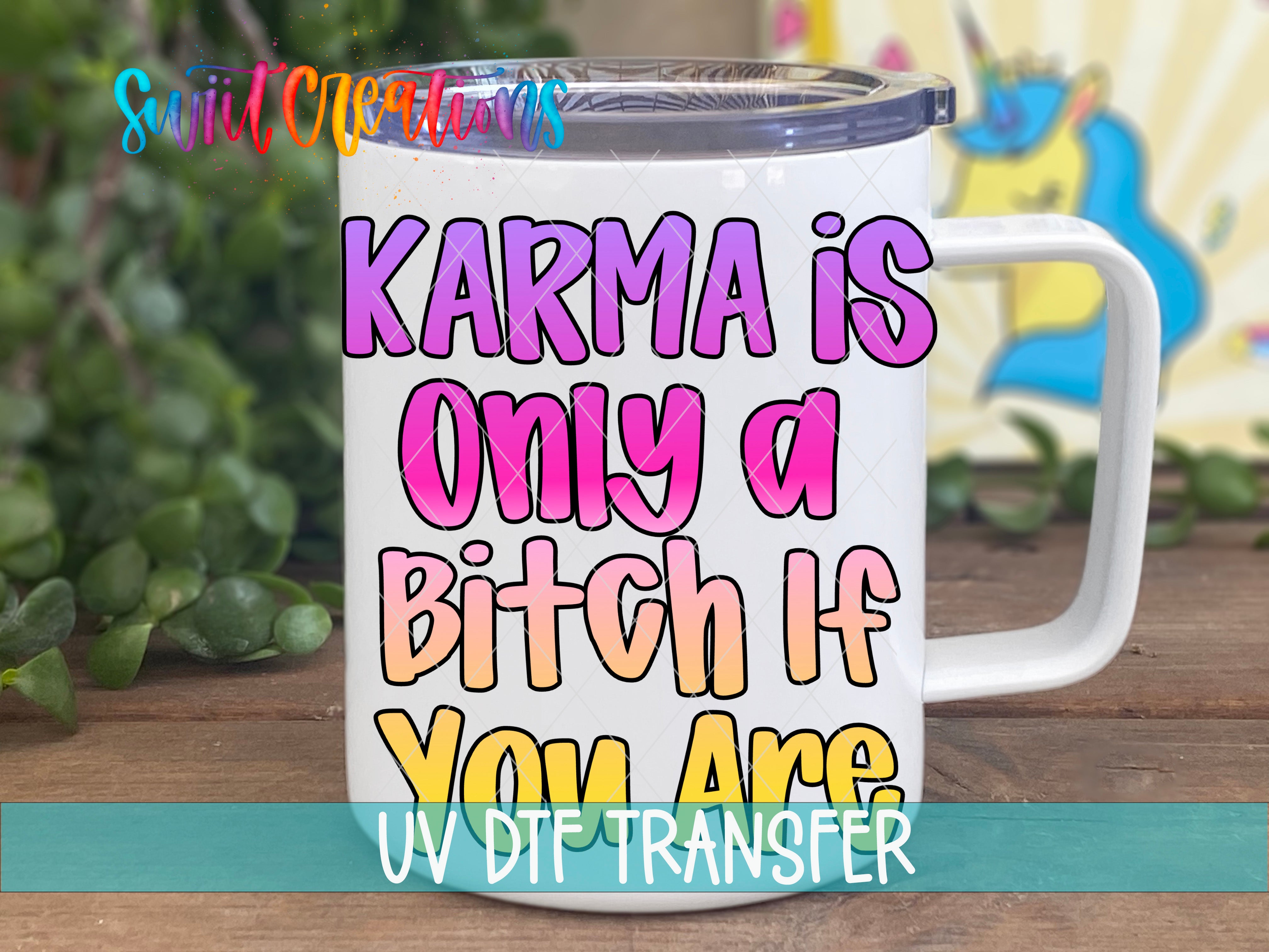 A white mug with colorful text that says "KARMA IS ONLY A BITCH IF YOU ARE" printed on it.
