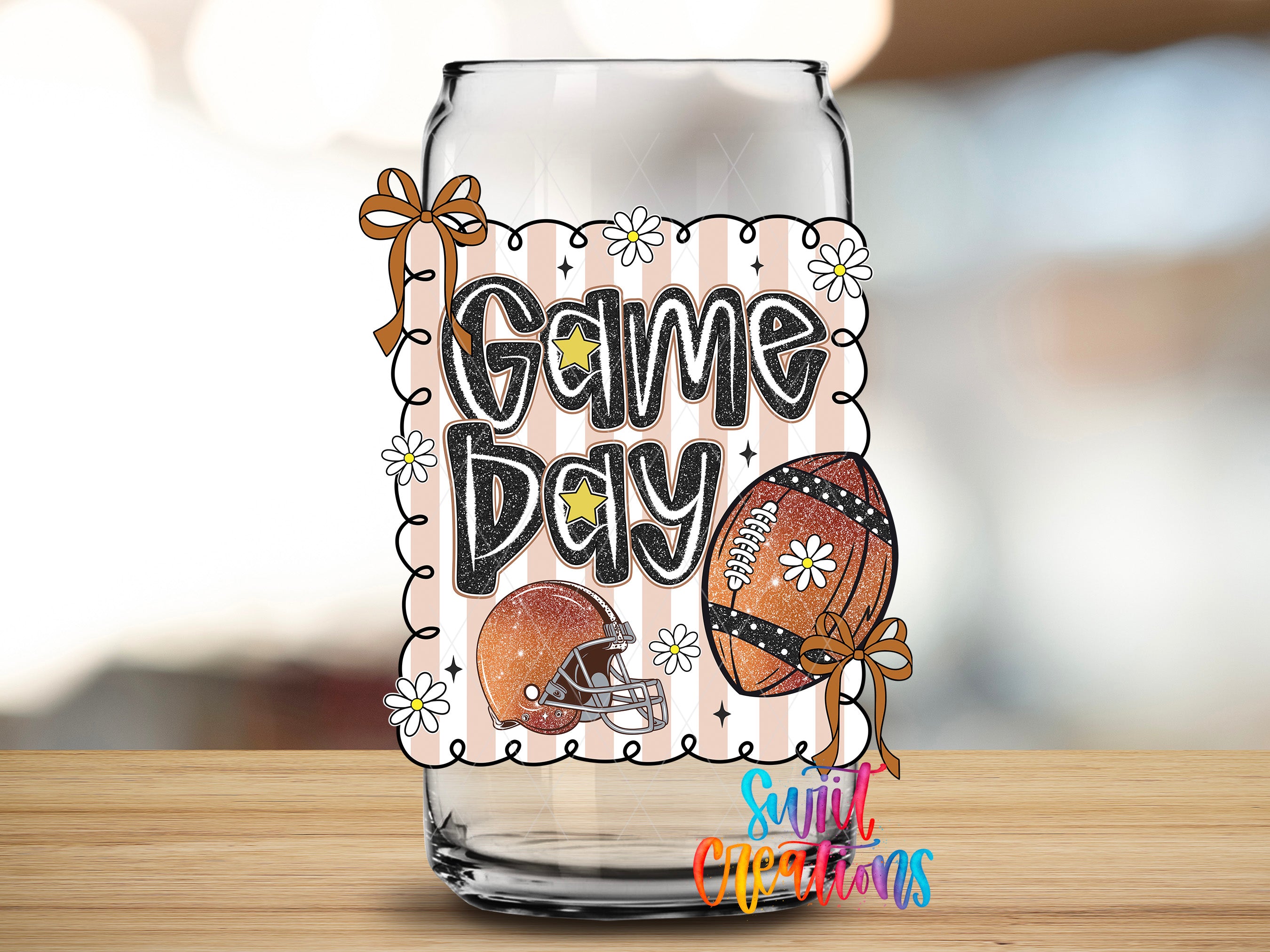A glass can with a decorative label that says "Game Day" and features illustrations of a football and a helmet.