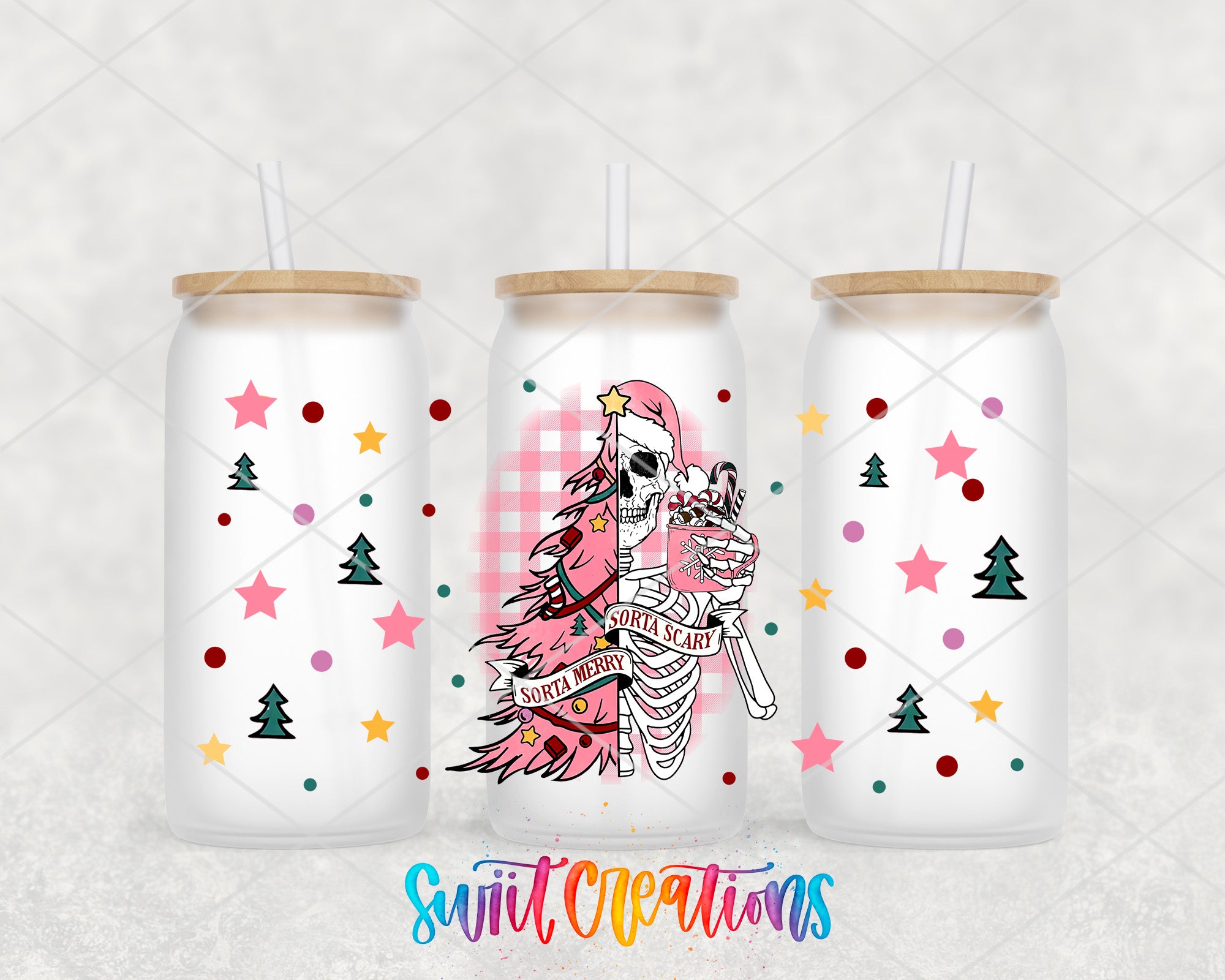 a set of three tumbles with a skeleton and a christmas tree on them